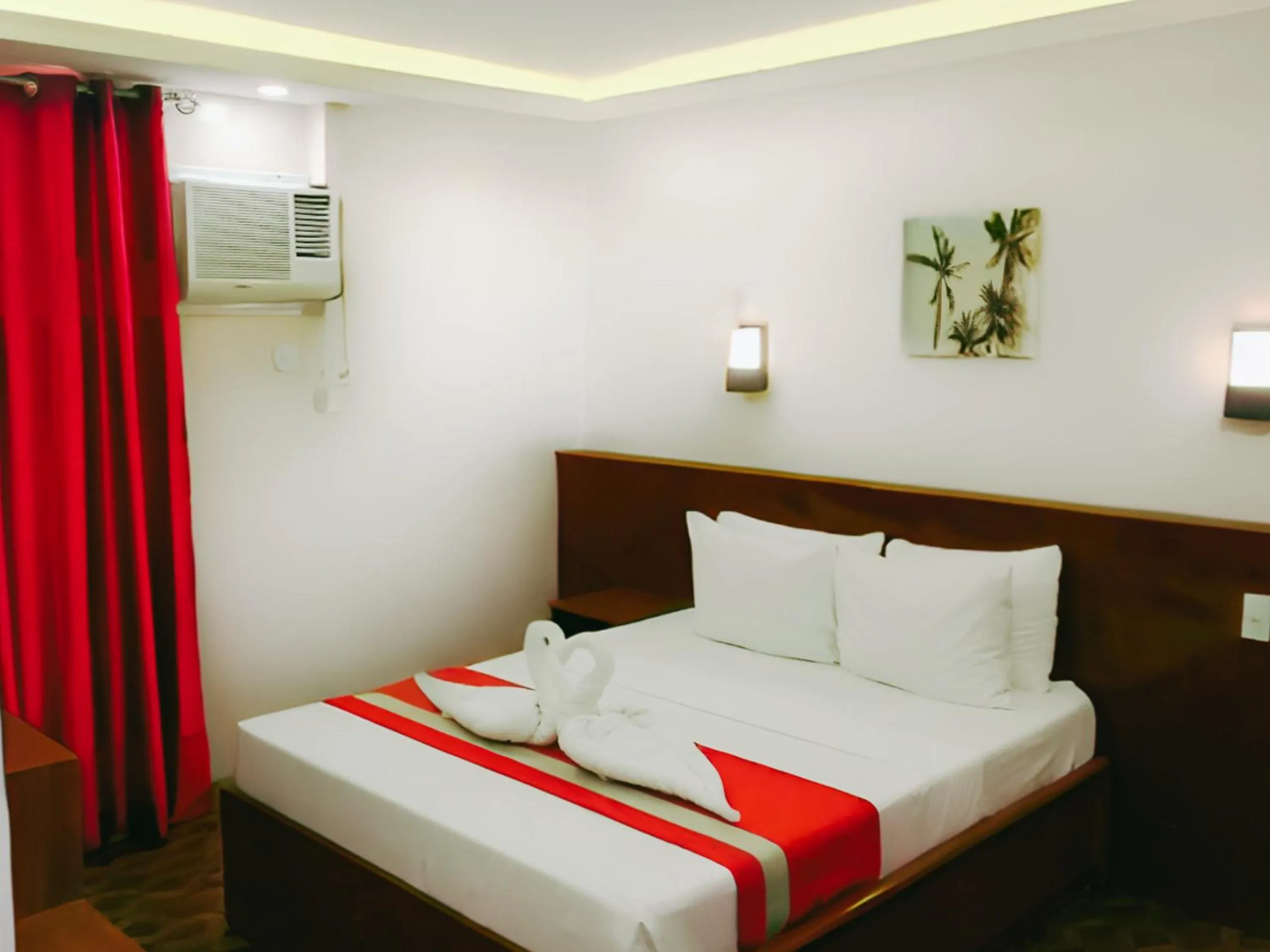 Bed in Dy Heritage Suites