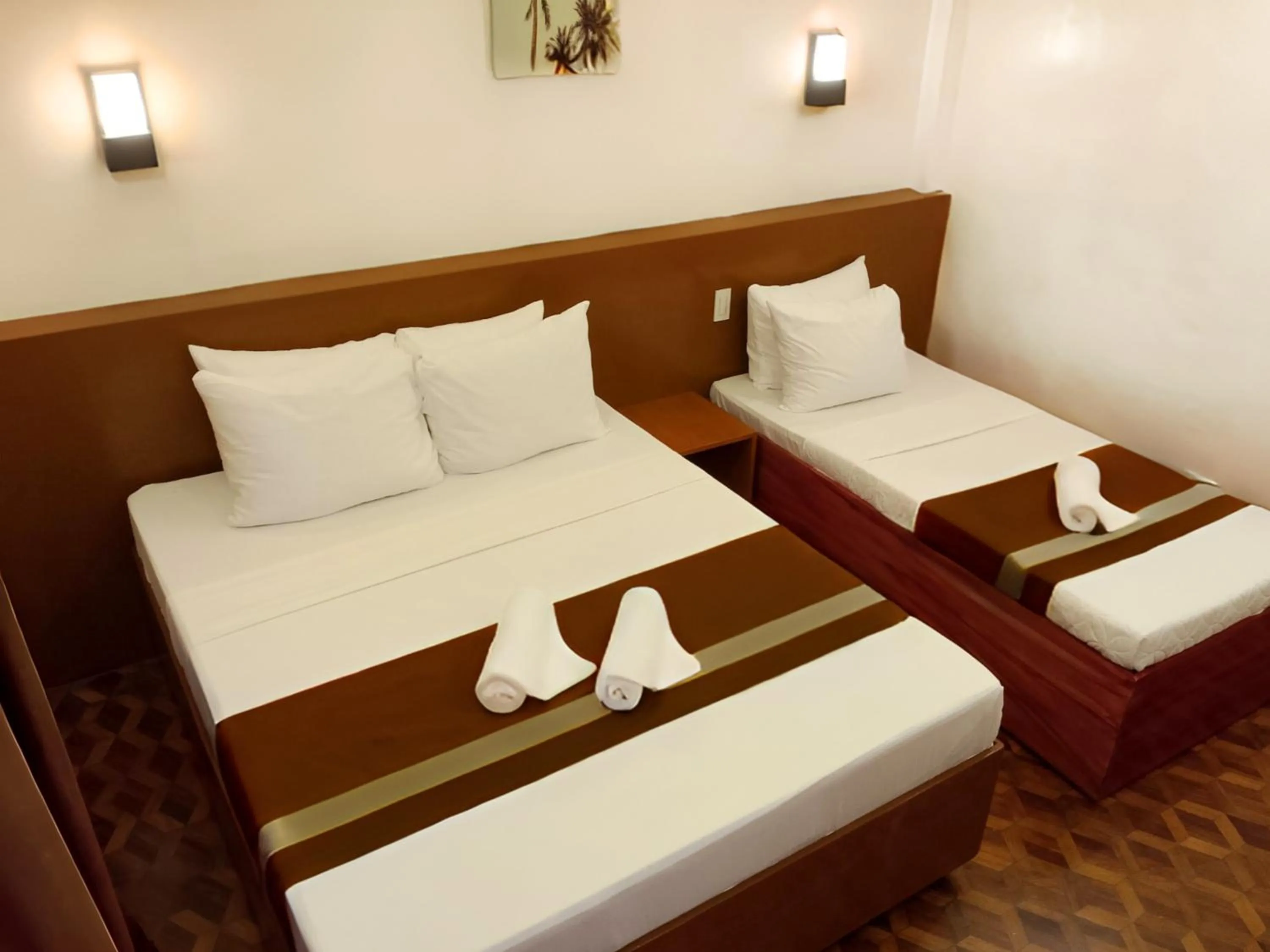 Bed in Dy Heritage Suites