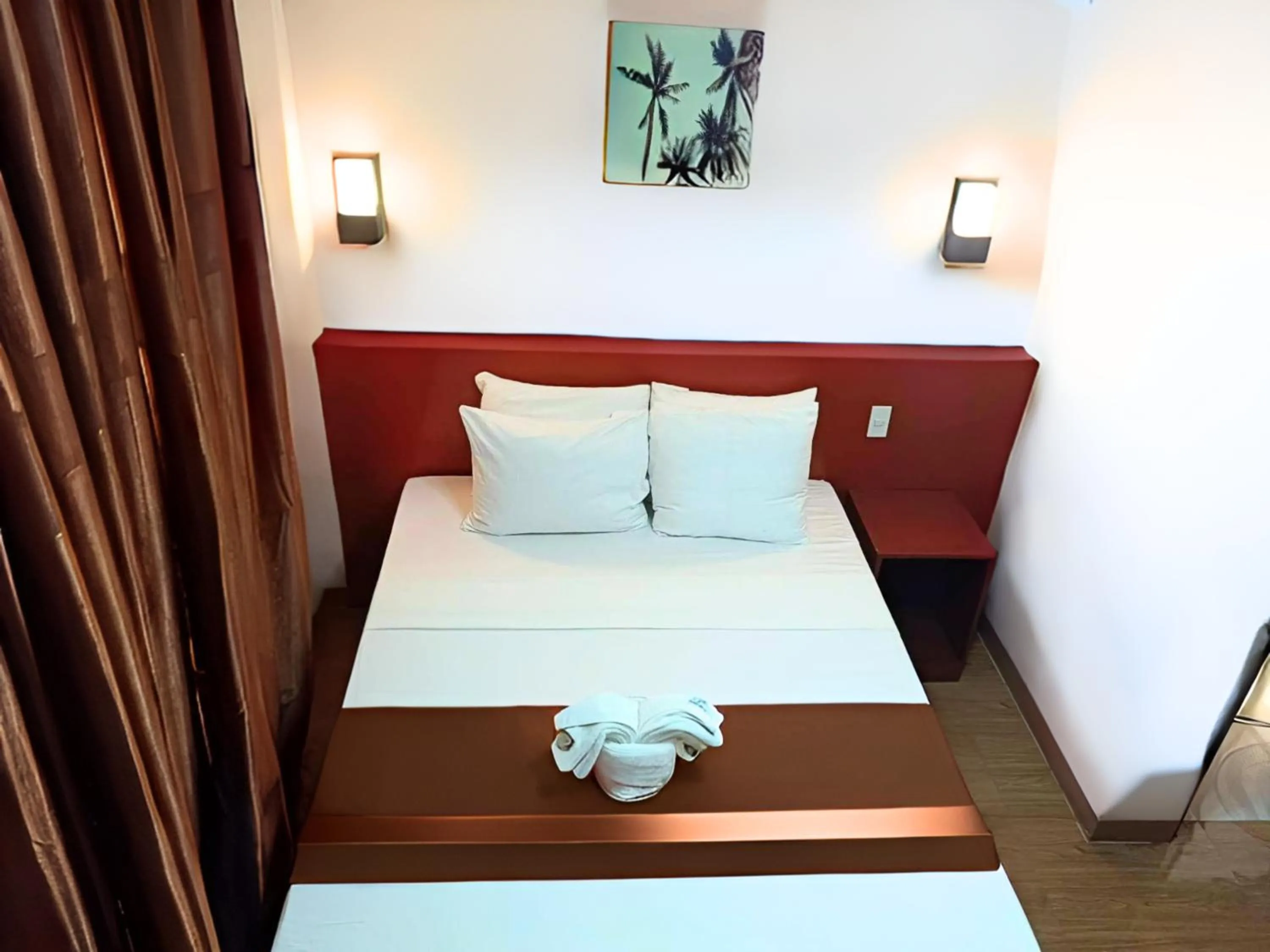 Bed in Dy Heritage Suites