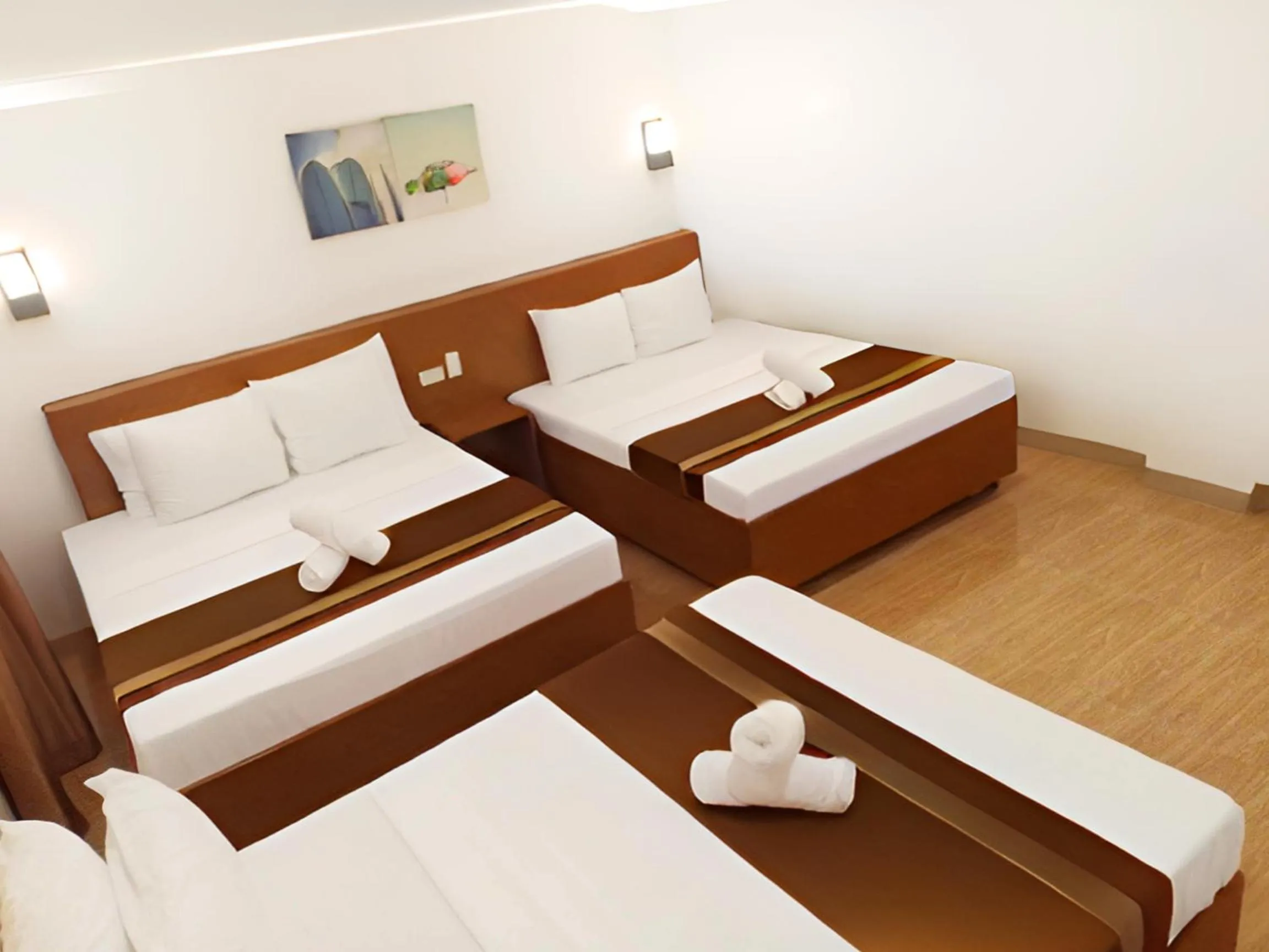 Bed in Dy Heritage Suites