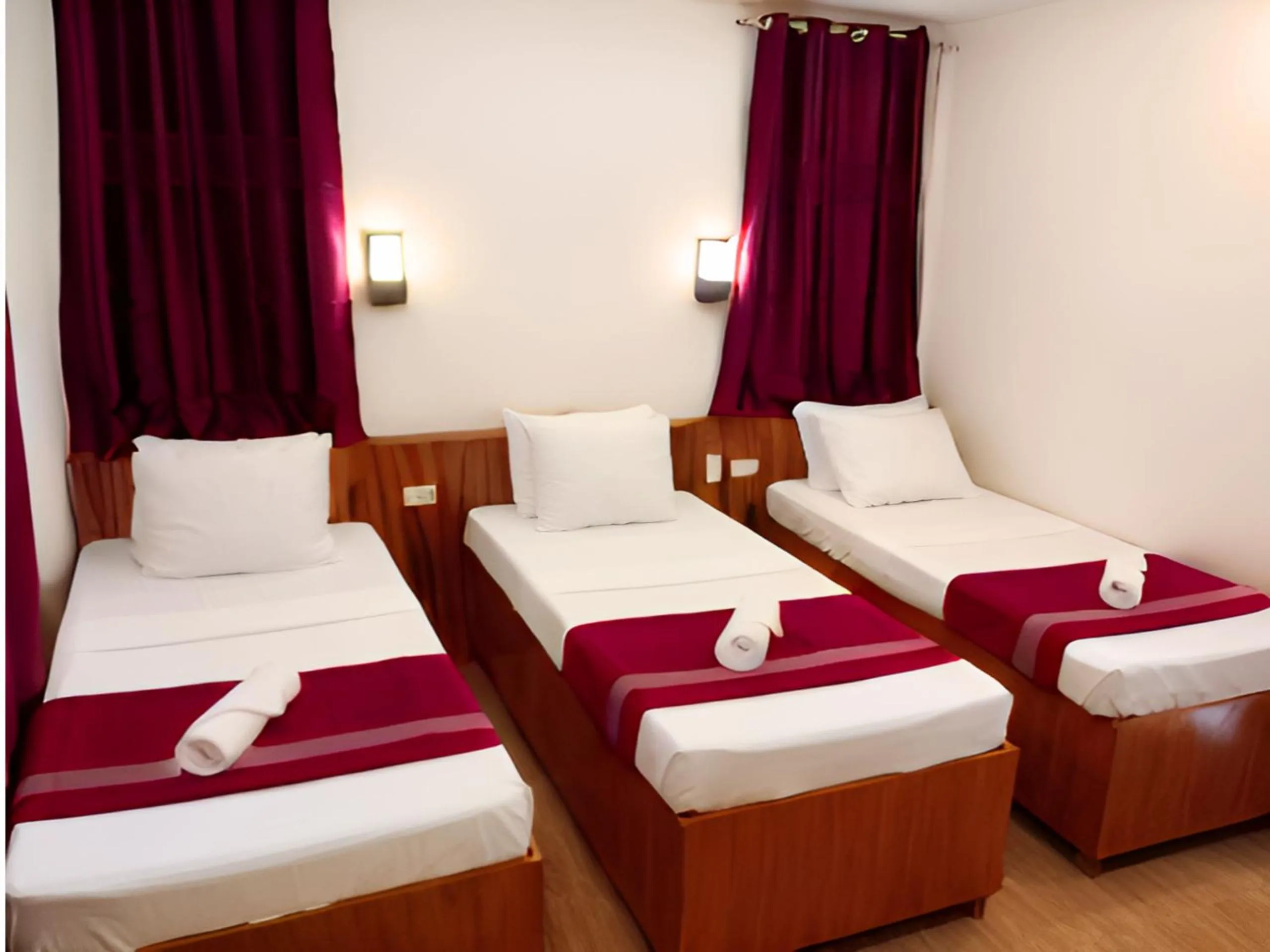 Bed in Dy Heritage Suites