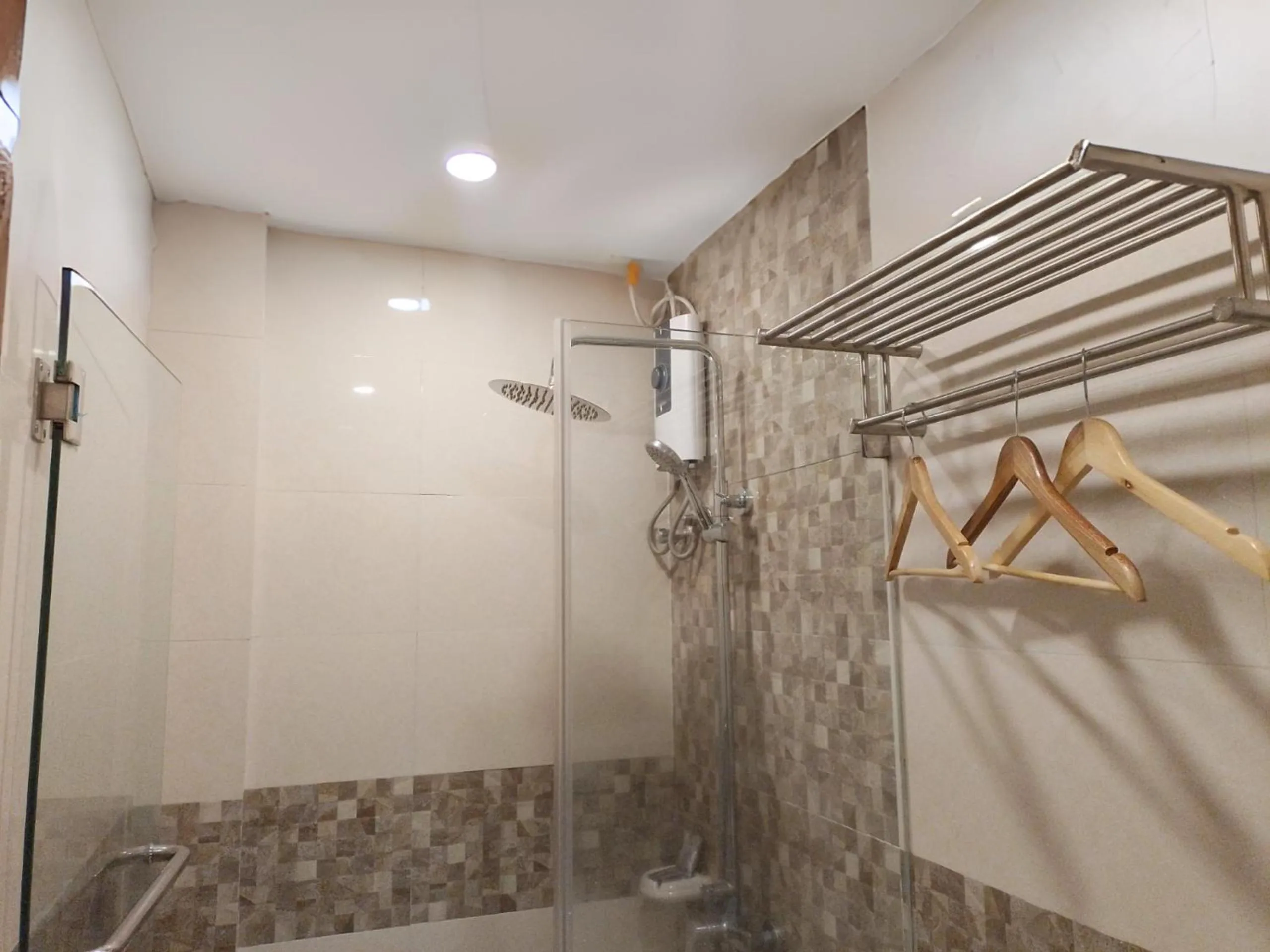 Shower in Dy Heritage Suites