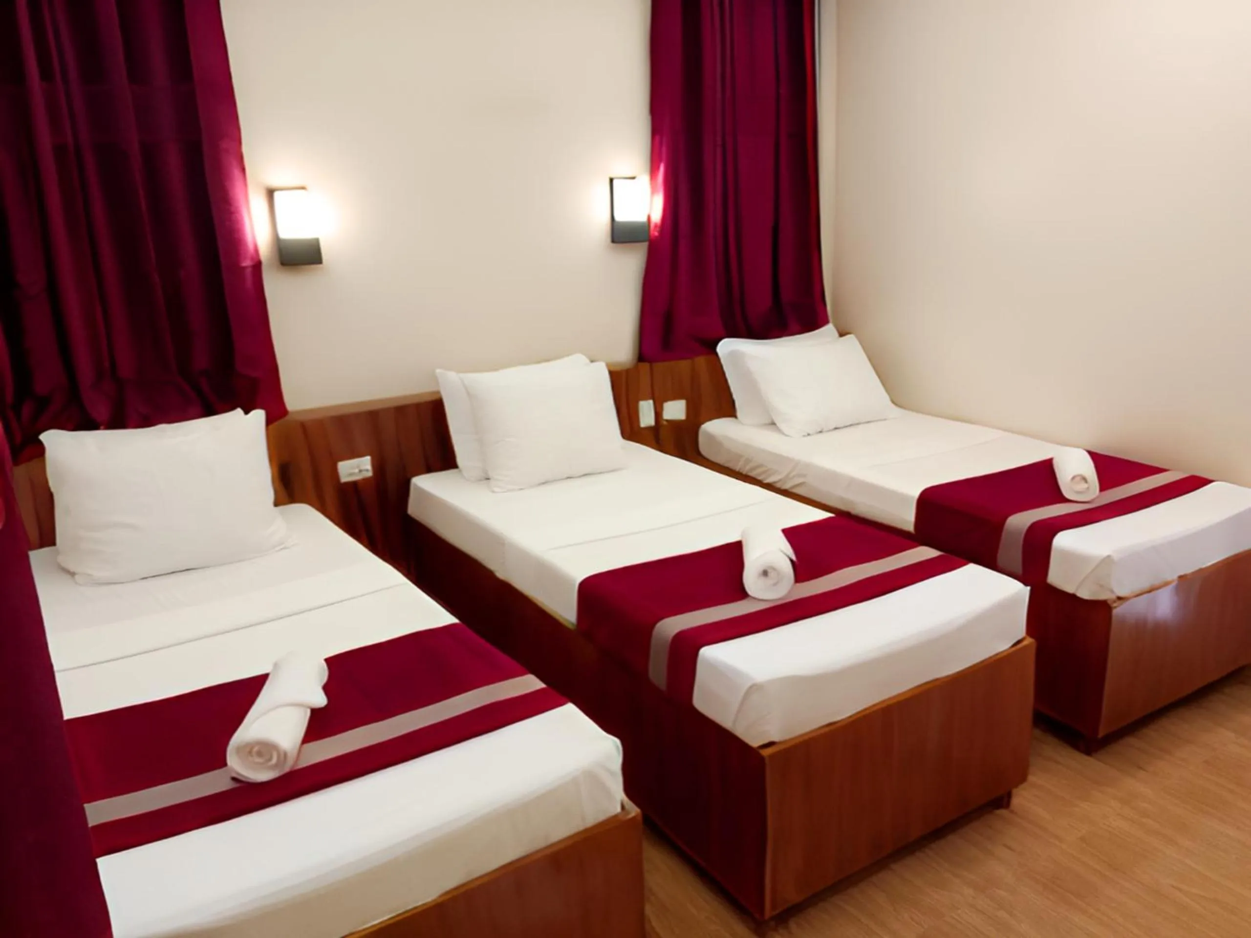 Bed in Dy Heritage Suites