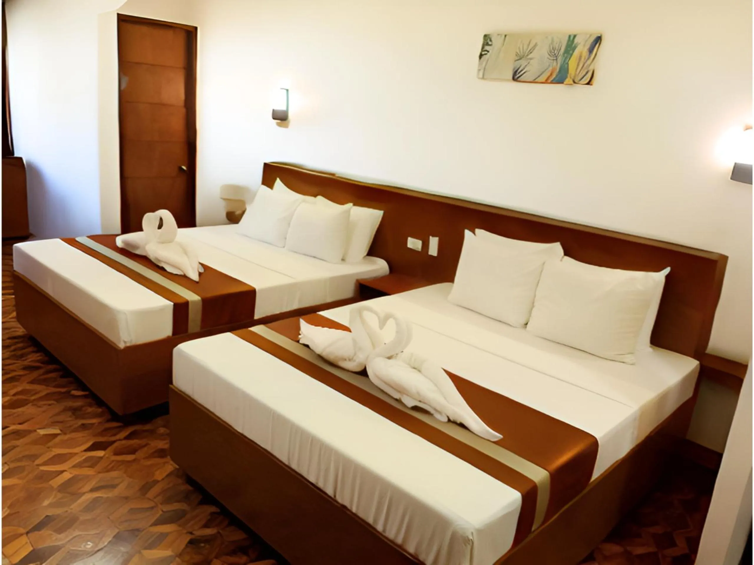 Bed in Dy Heritage Suites