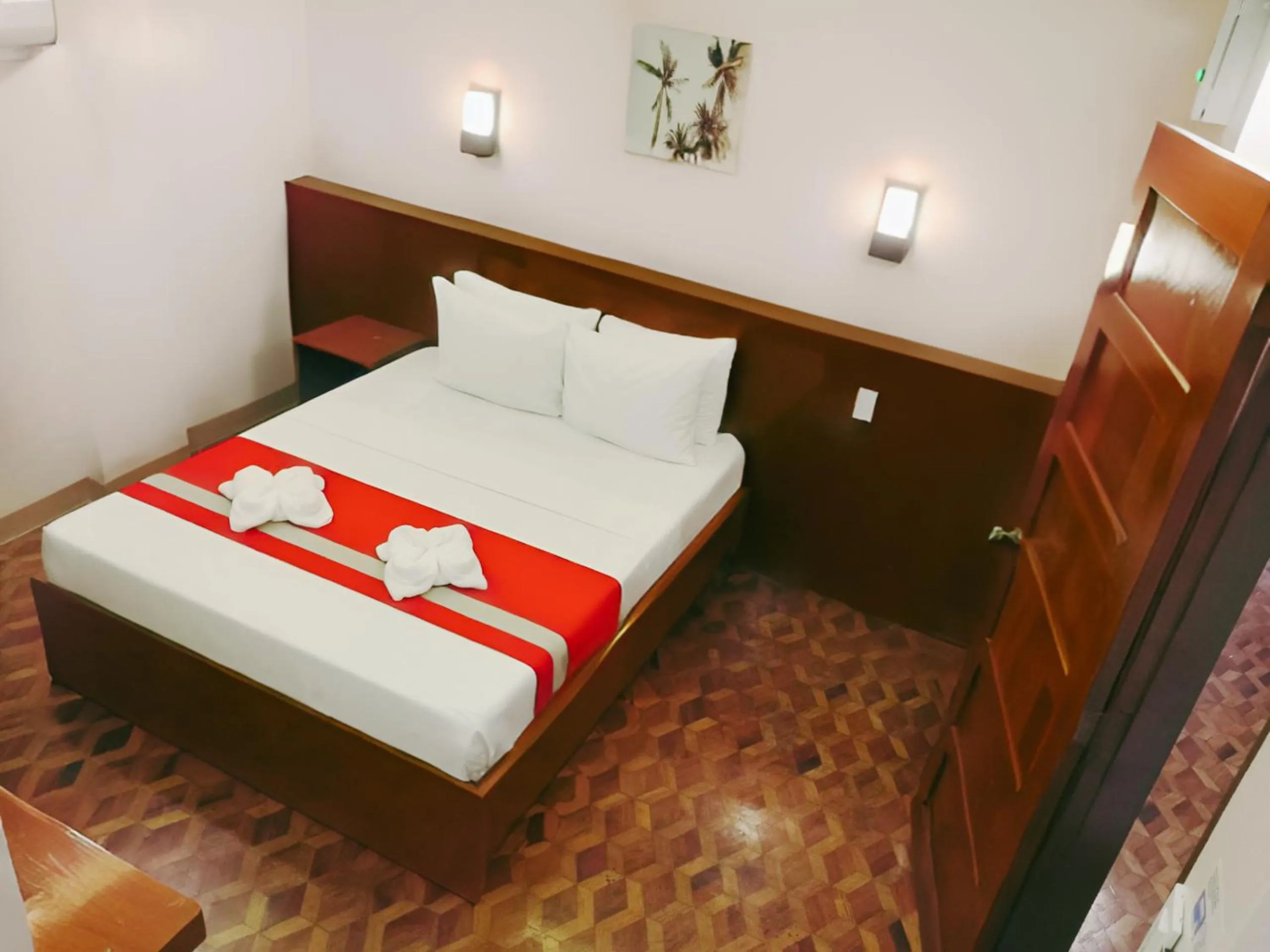 Bed in Dy Heritage Suites