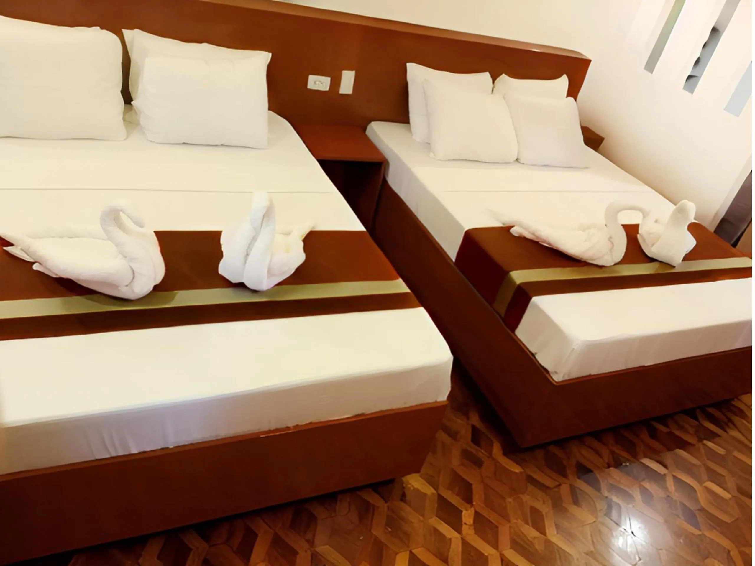 Bed in Dy Heritage Suites