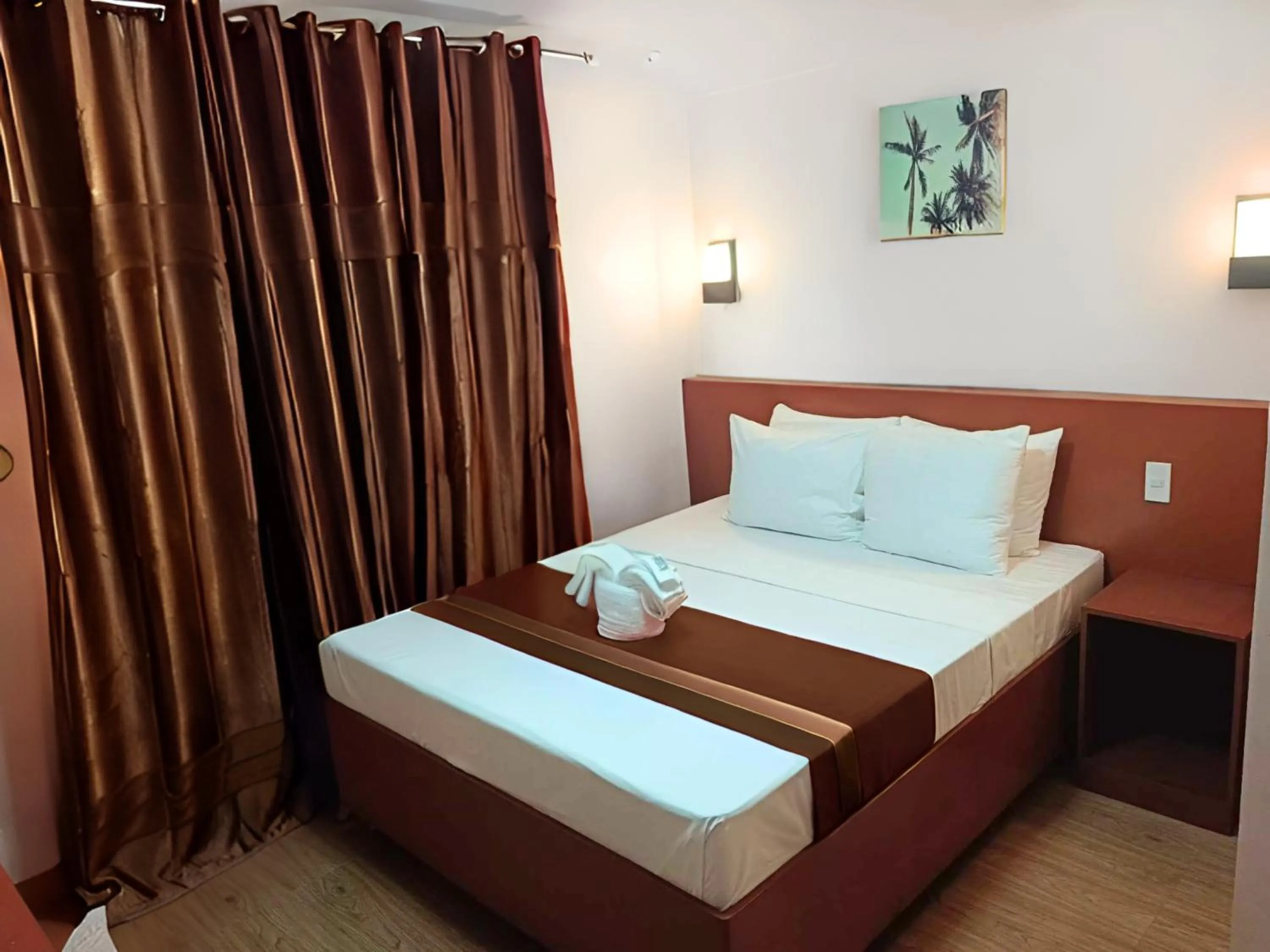 Bed in Dy Heritage Suites