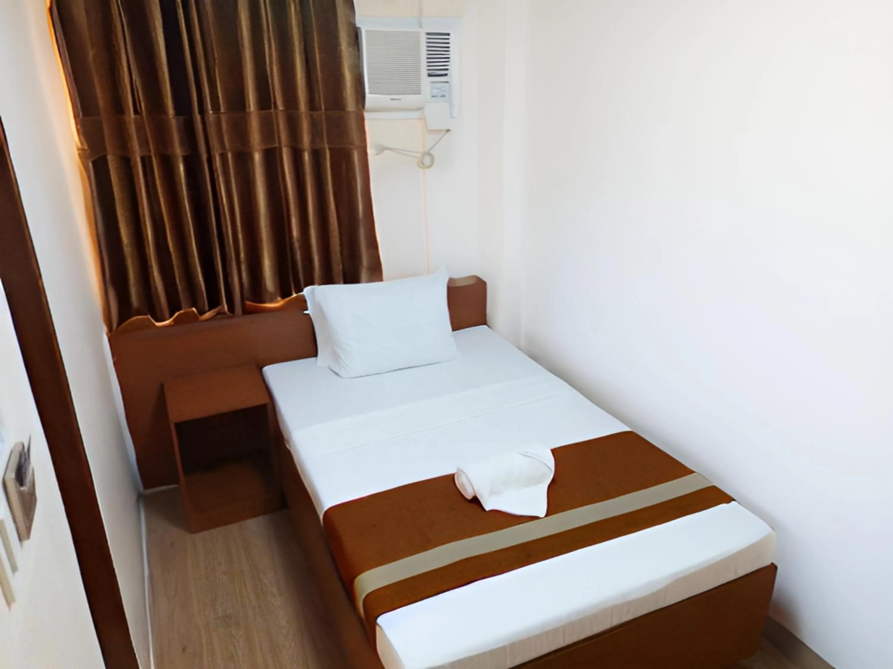 Bed in Dy Heritage Suites