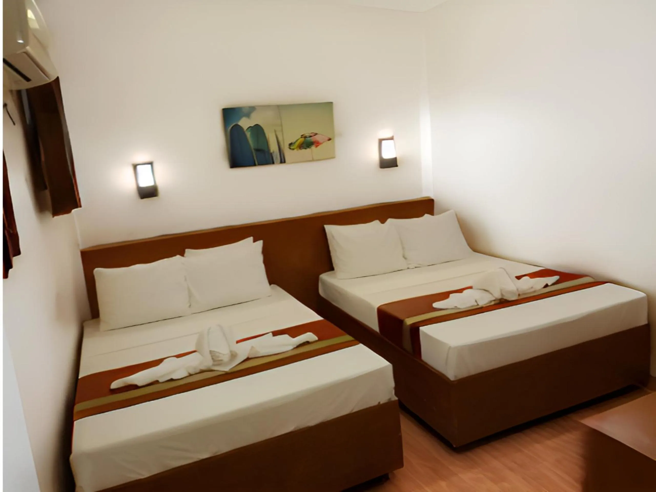 Bed in Dy Heritage Suites