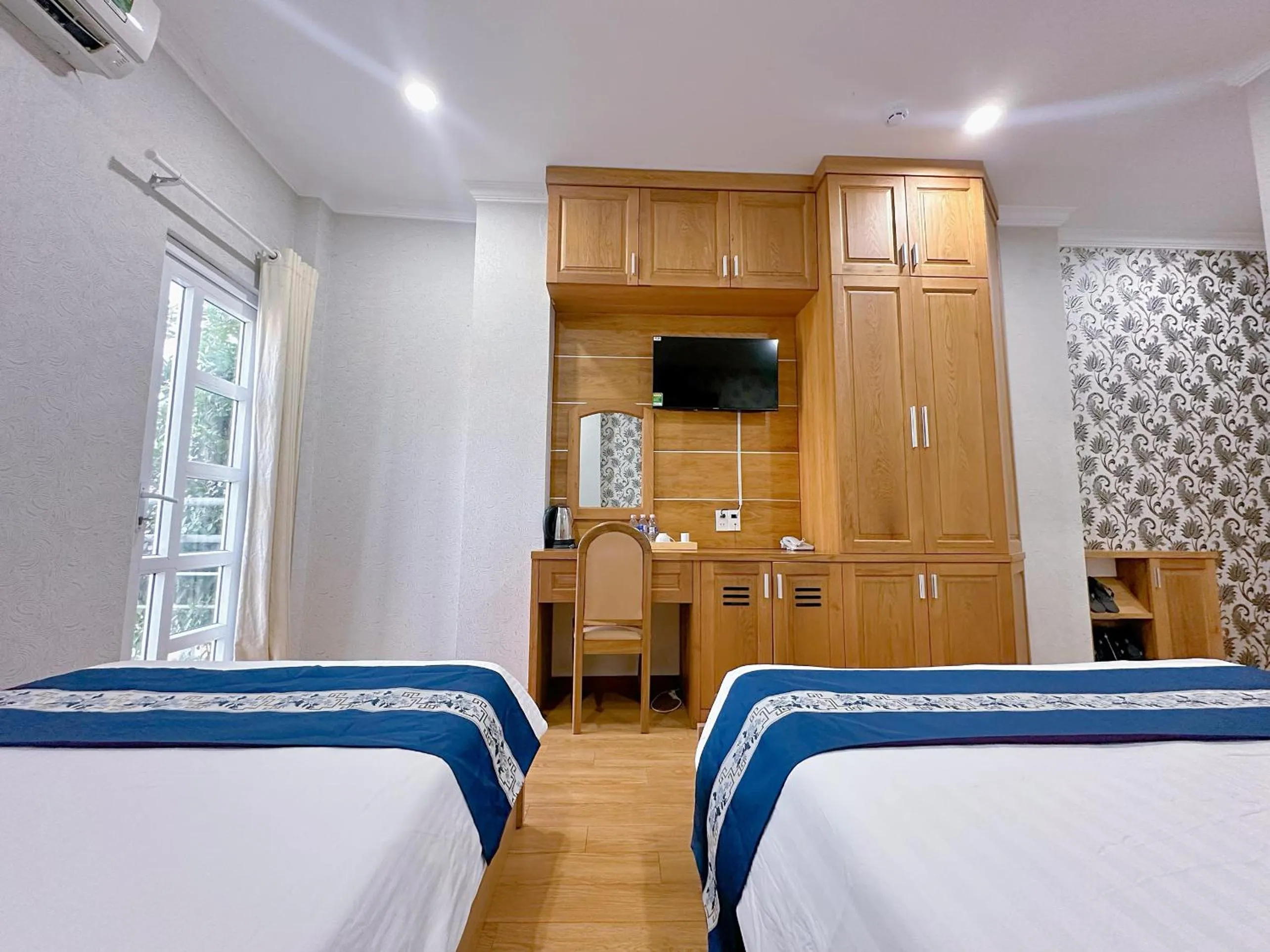 Property building, Bed in Tra My Hotel - SaiGon Center