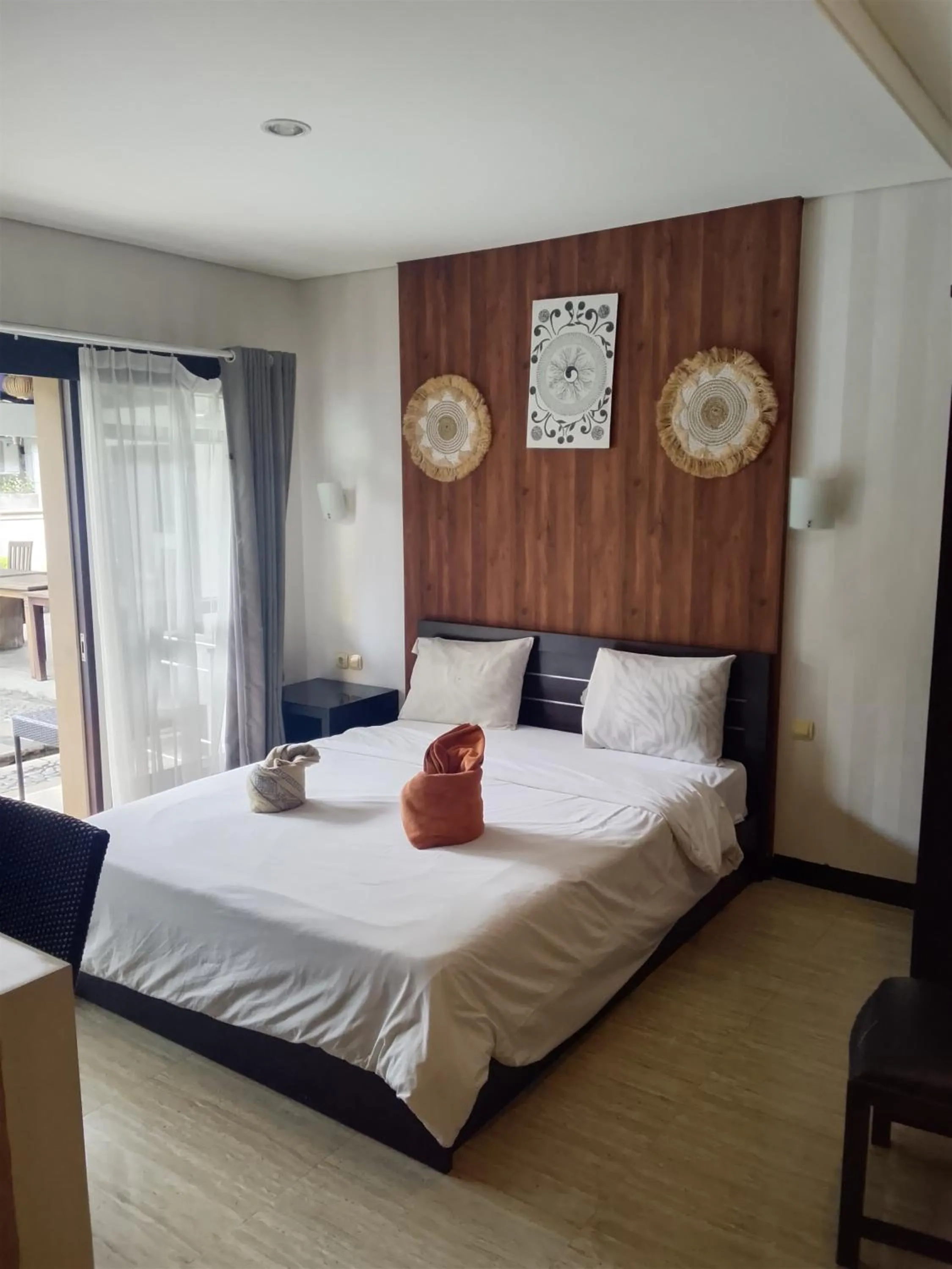 Bed in NEW KUBU DI BUKIT apartemen & motor bike rental near beach and 10 minute to airpot