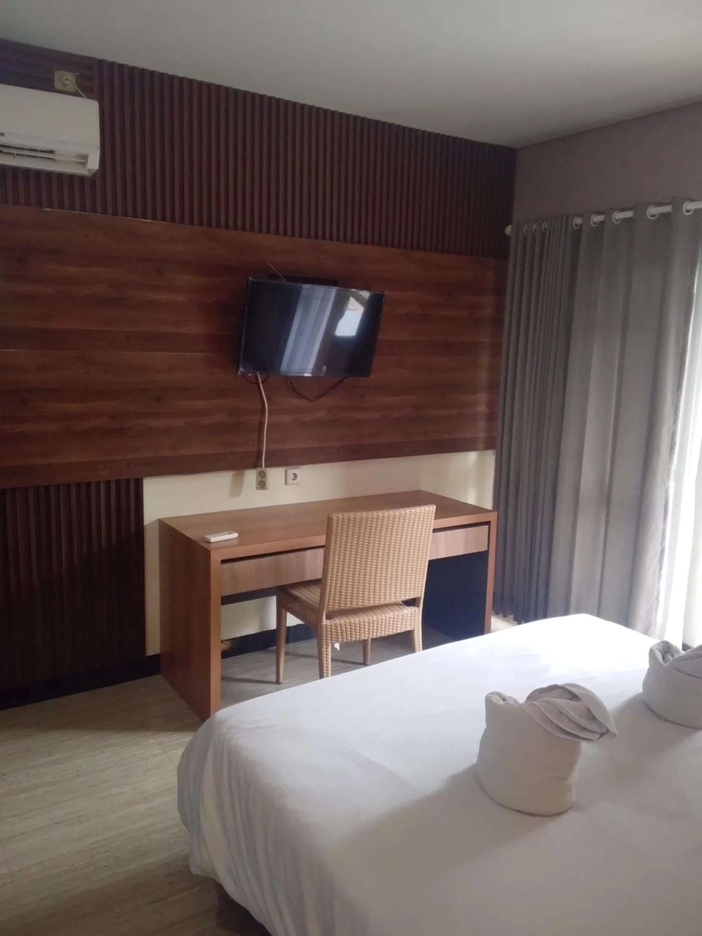 TV and multimedia, Bed in NEW KUBU DI BUKIT apartemen & motor bike rental near beach and 10 minute to airpot