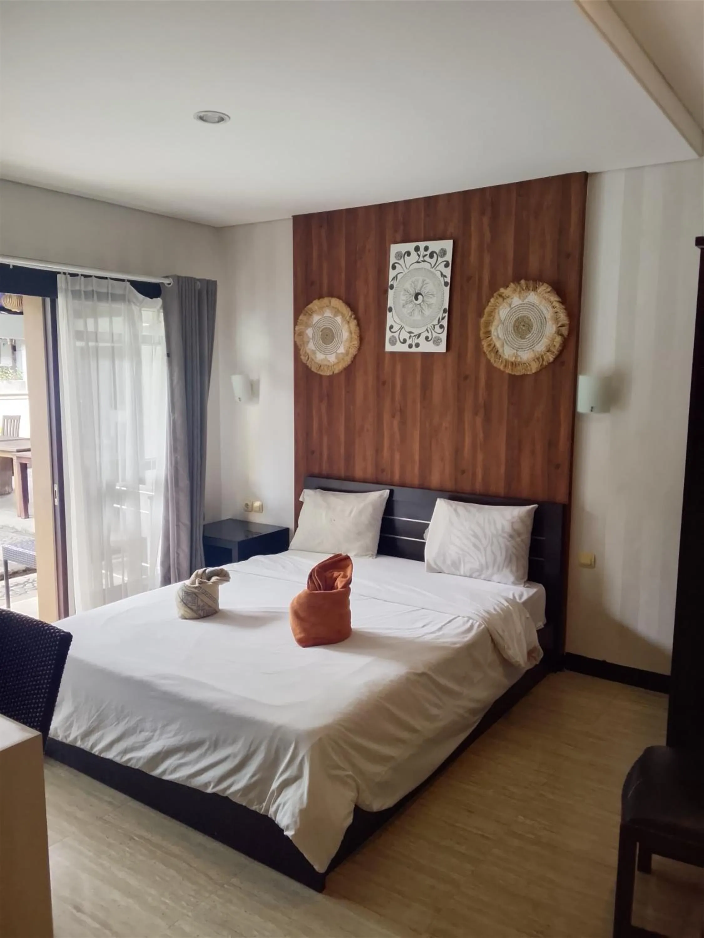 Photo of the whole room, Bed in NEW KUBU DI BUKIT apartemen & motor bike rental near beach and 10 minute to airpot