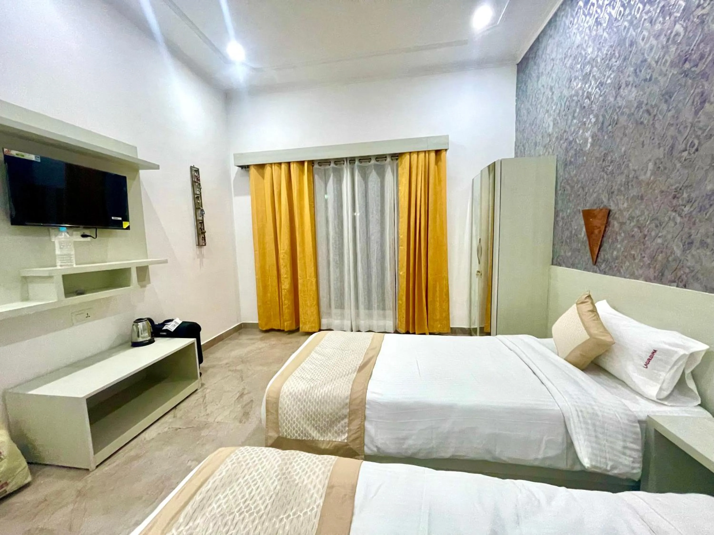 Bed in La Curcuma Luxury Homestay