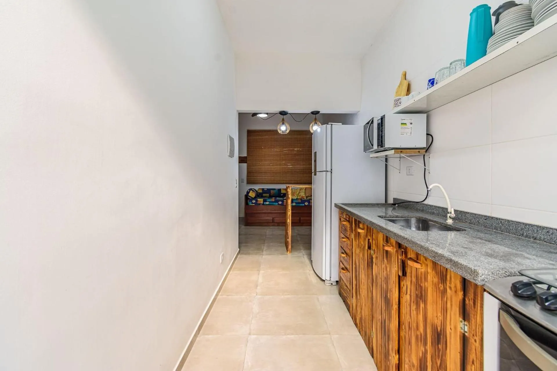 Kitchen or kitchenette in Apto com churrasqueira elétrica próximo à praia