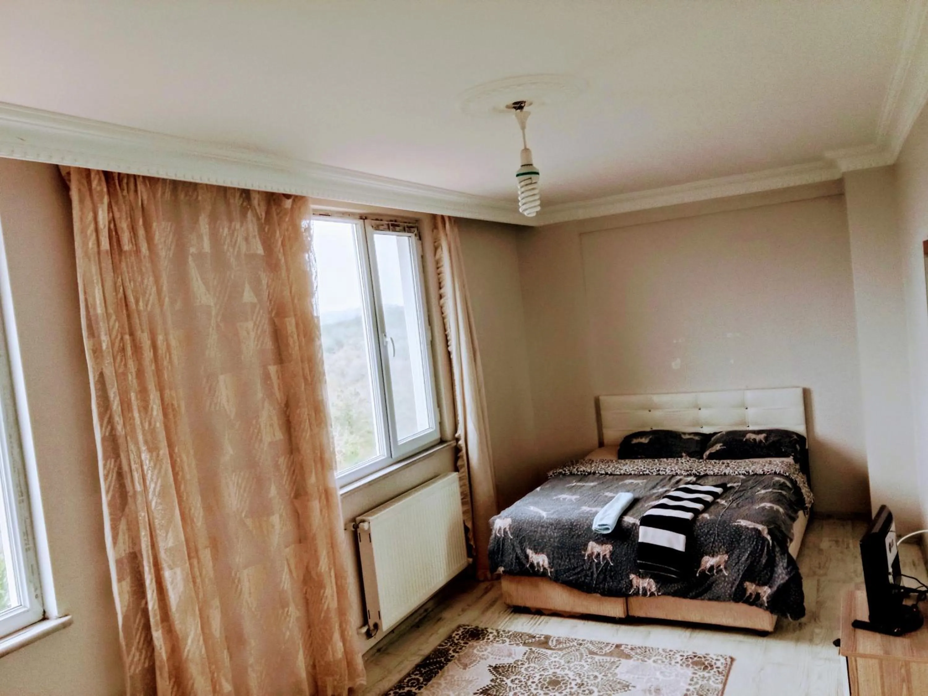 Bed in Ahmet teacher's villa, 6 minutes from the airport