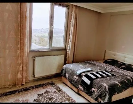 Bed in Ahmet teacher's villa, 6 minutes from the airport