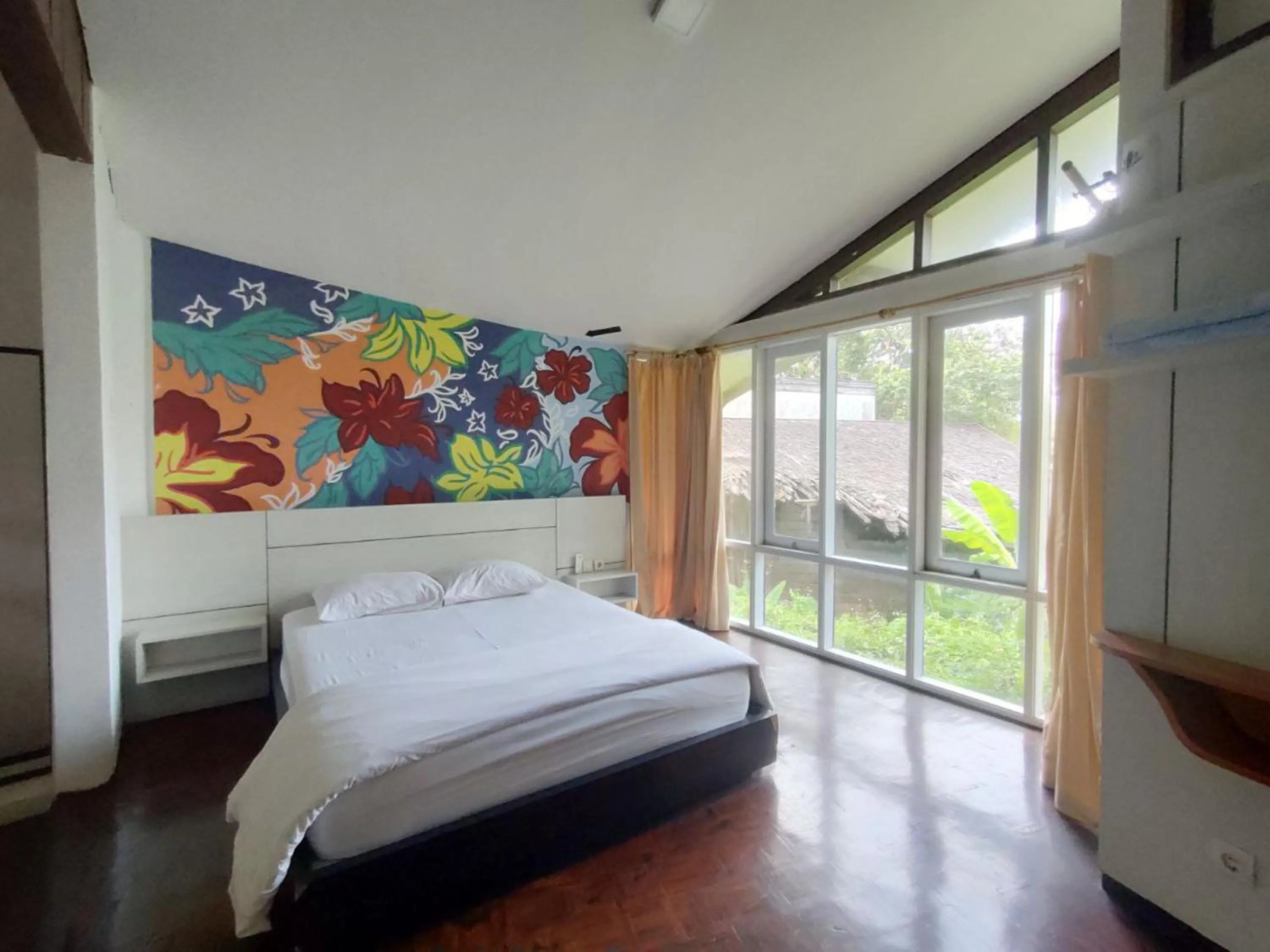 Bed in Grand Mulia Sakinah Boutique Resort Pandaan