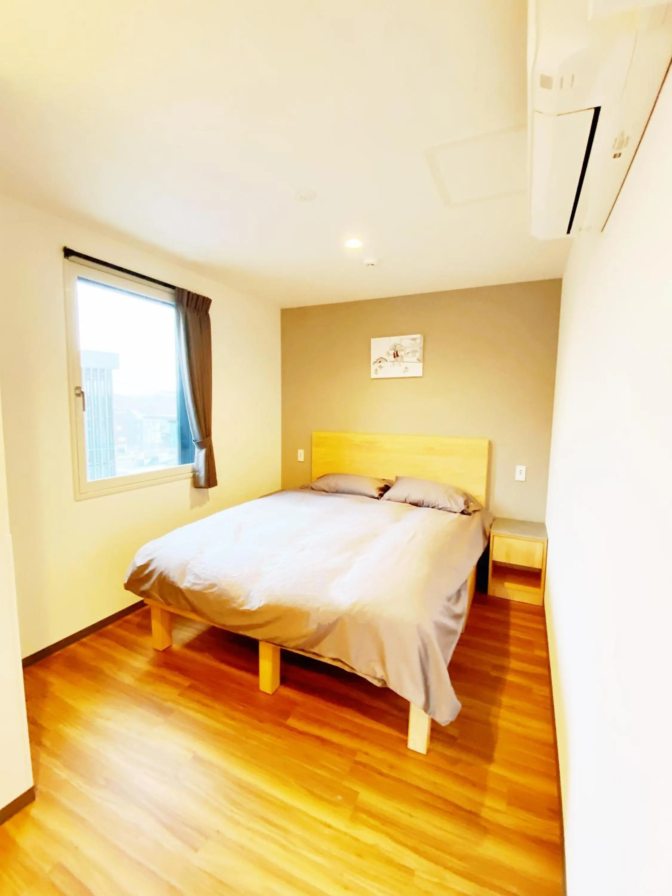 Bed in Q FOX GMG HOTEL