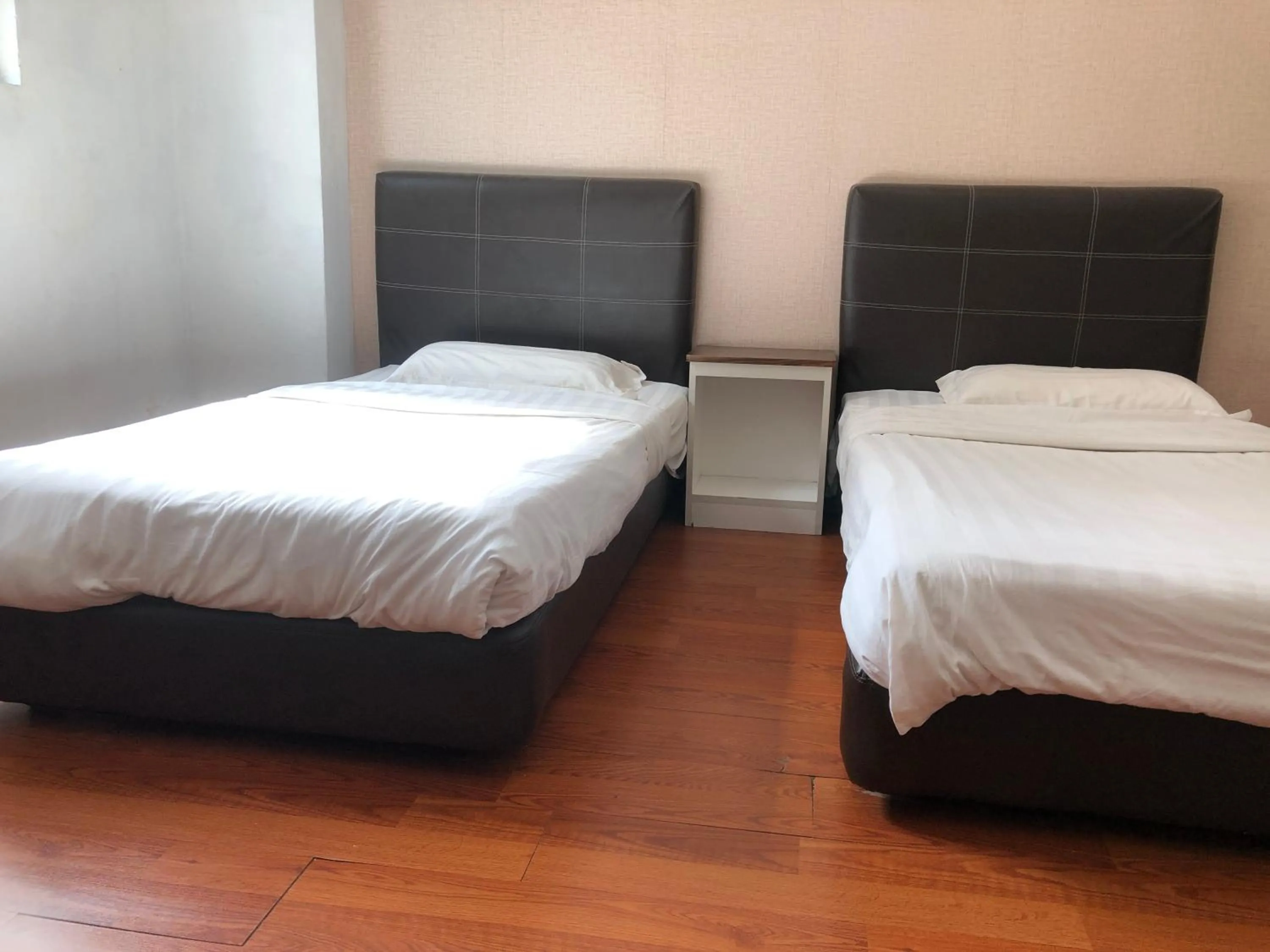 Bedroom in Super OYO 90668 Joy Inn