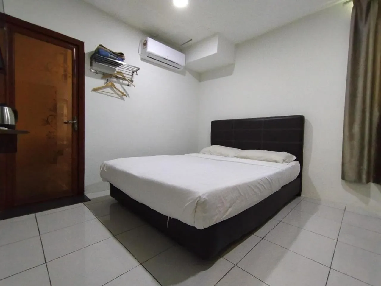 Bedroom in Super OYO 90668 Joy Inn