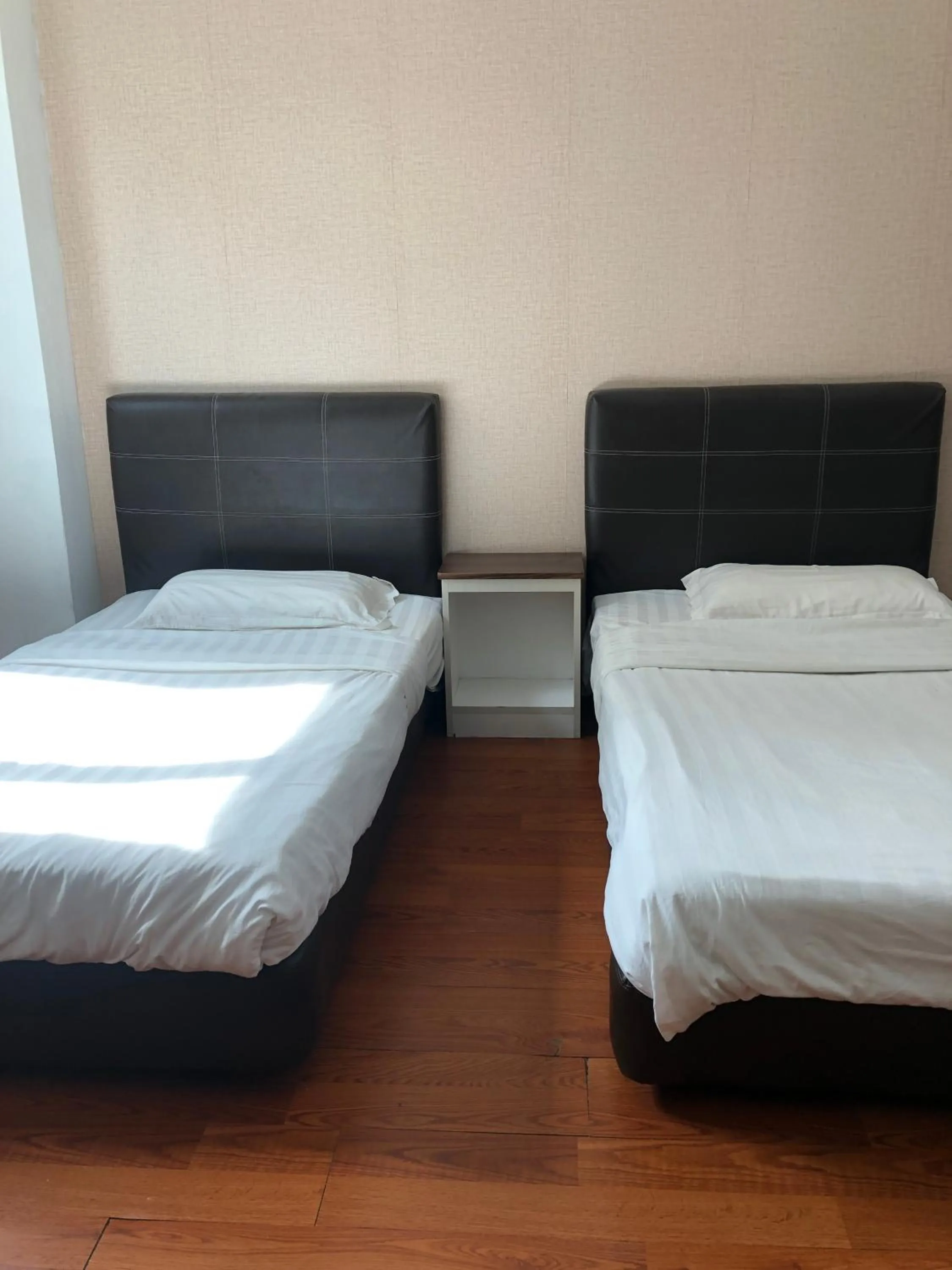 Bedroom in Super OYO 90668 Joy Inn