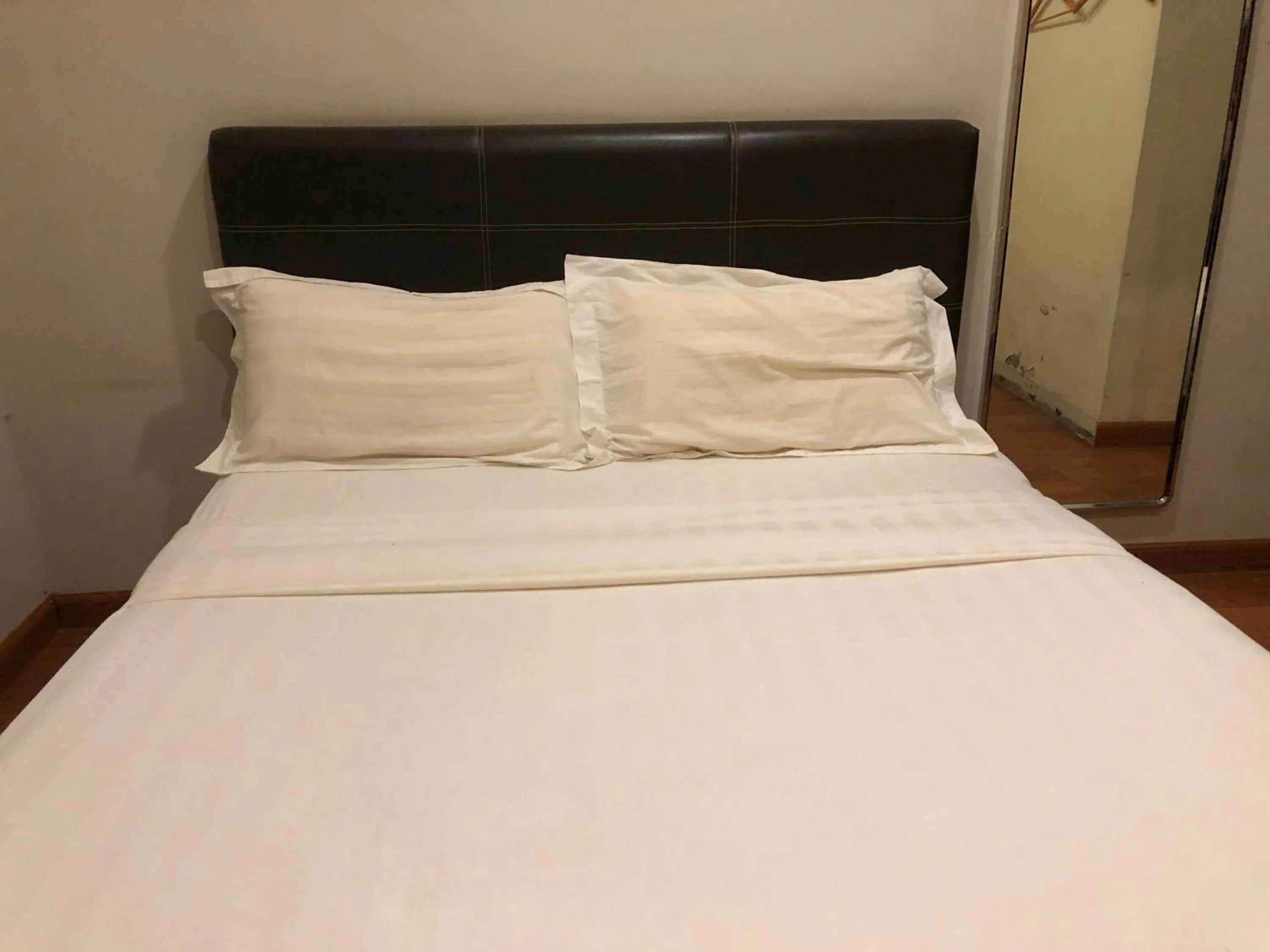 Bedroom in Super OYO 90668 Joy Inn