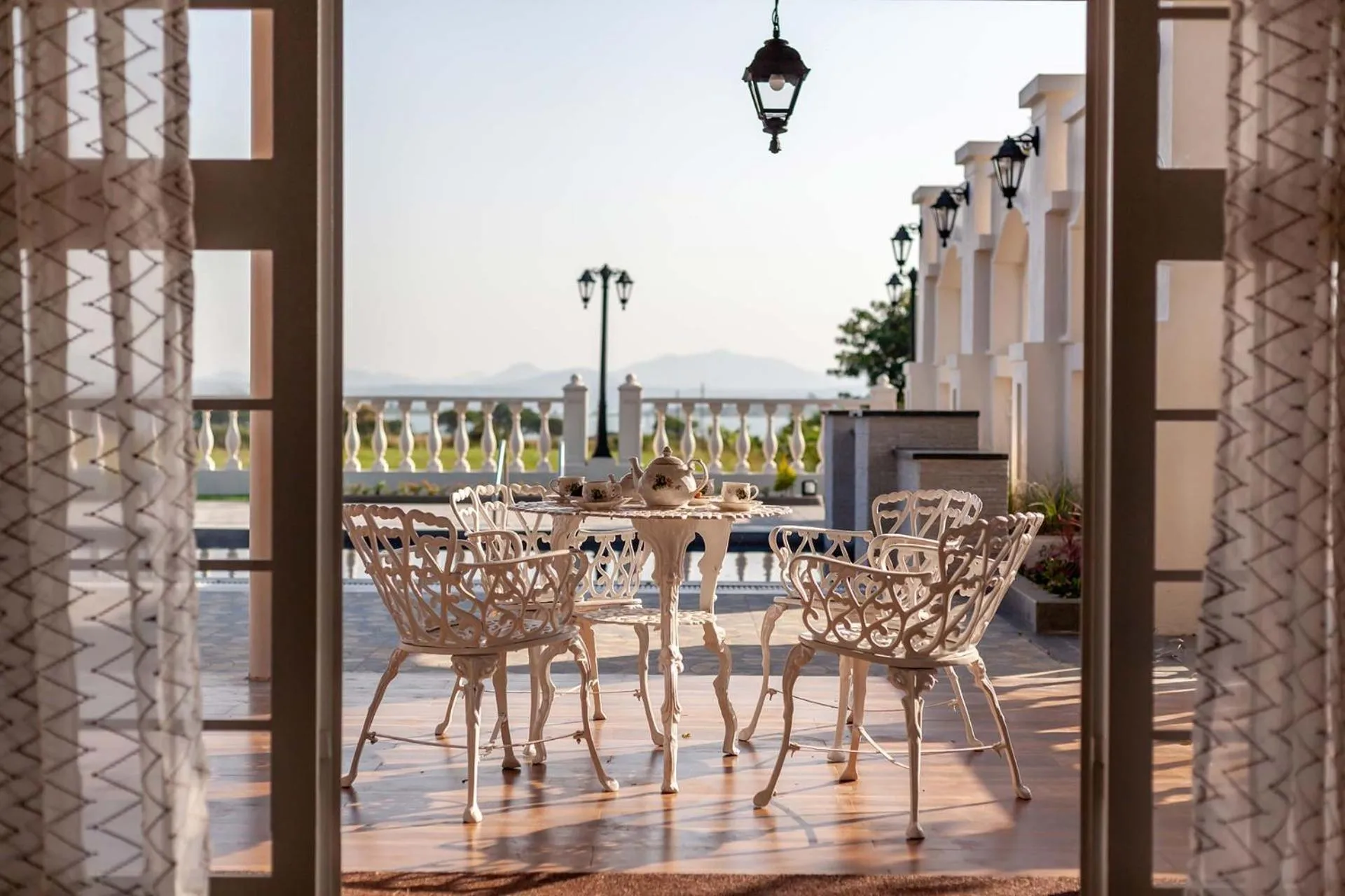 Seating area in StayVista's Lake La Vie - Tranquil Lake-View Villa Amidst Farmland with Pool and Poolside Gazebo - Proximity to Sula