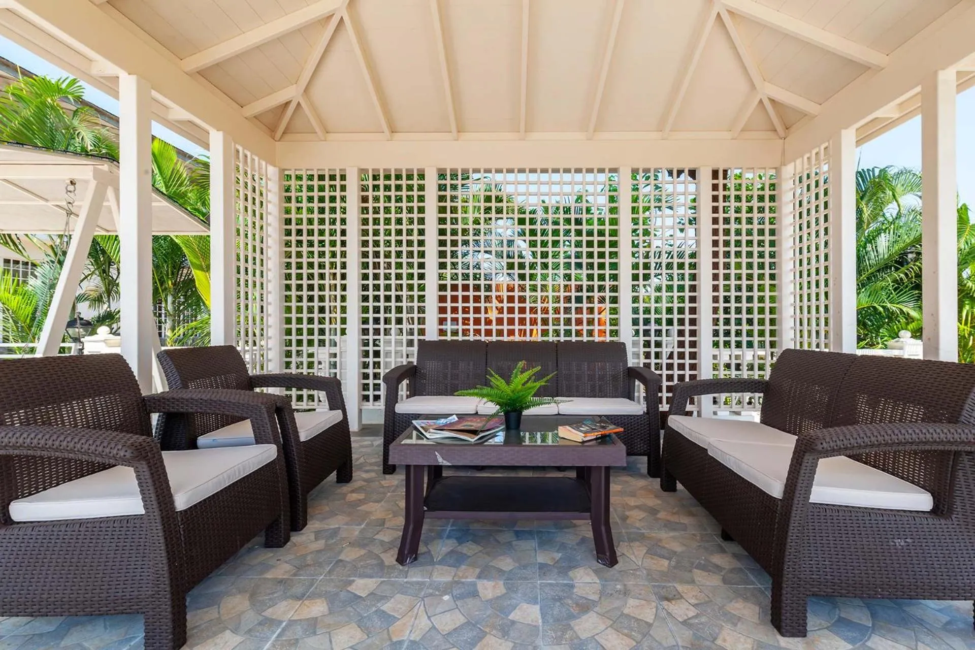Seating area in StayVista's Lake La Vie - Tranquil Lake-View Villa Amidst Farmland with Pool and Poolside Gazebo - Proximity to Sula