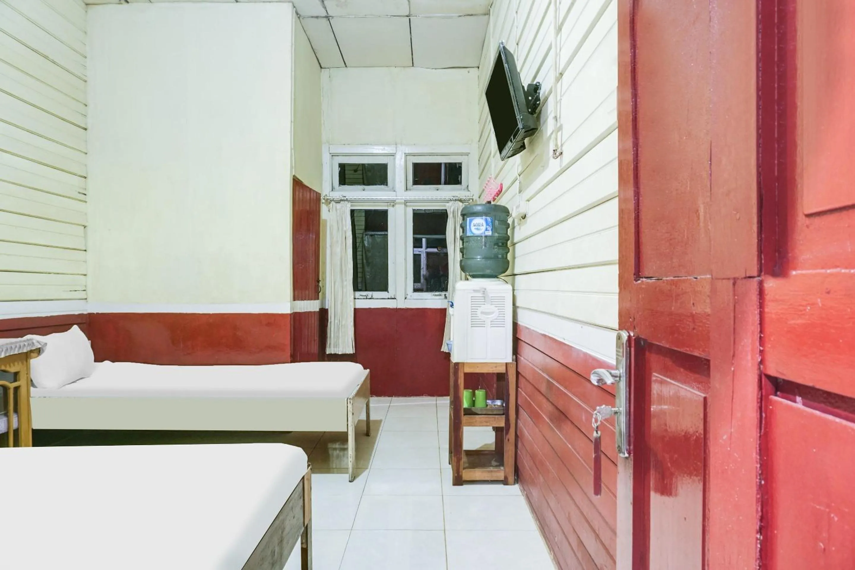 Bedroom in Hotel O Anggrek Daqu Syariah Kapuas