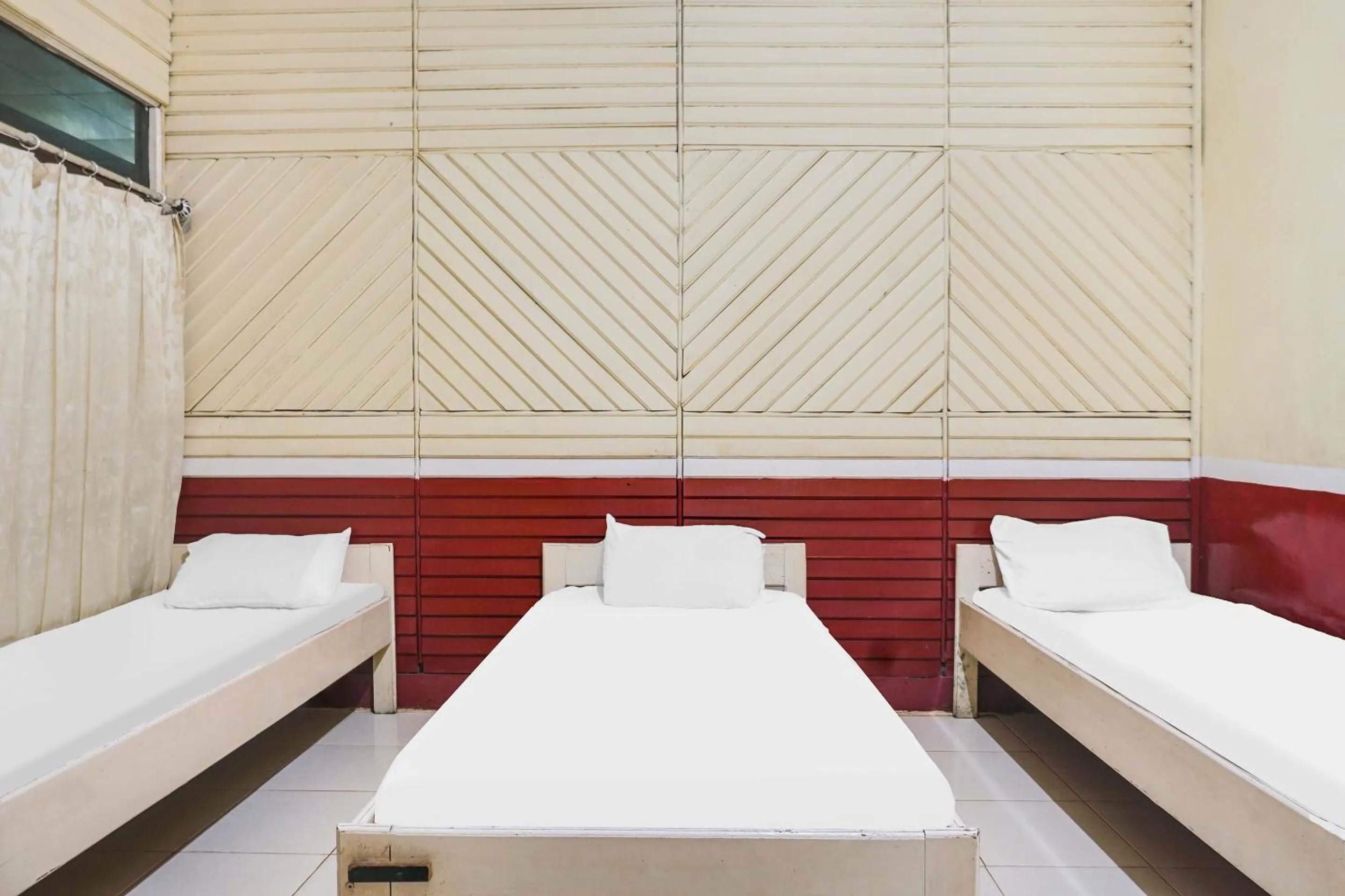 Bedroom in Hotel O Anggrek Daqu Syariah Kapuas