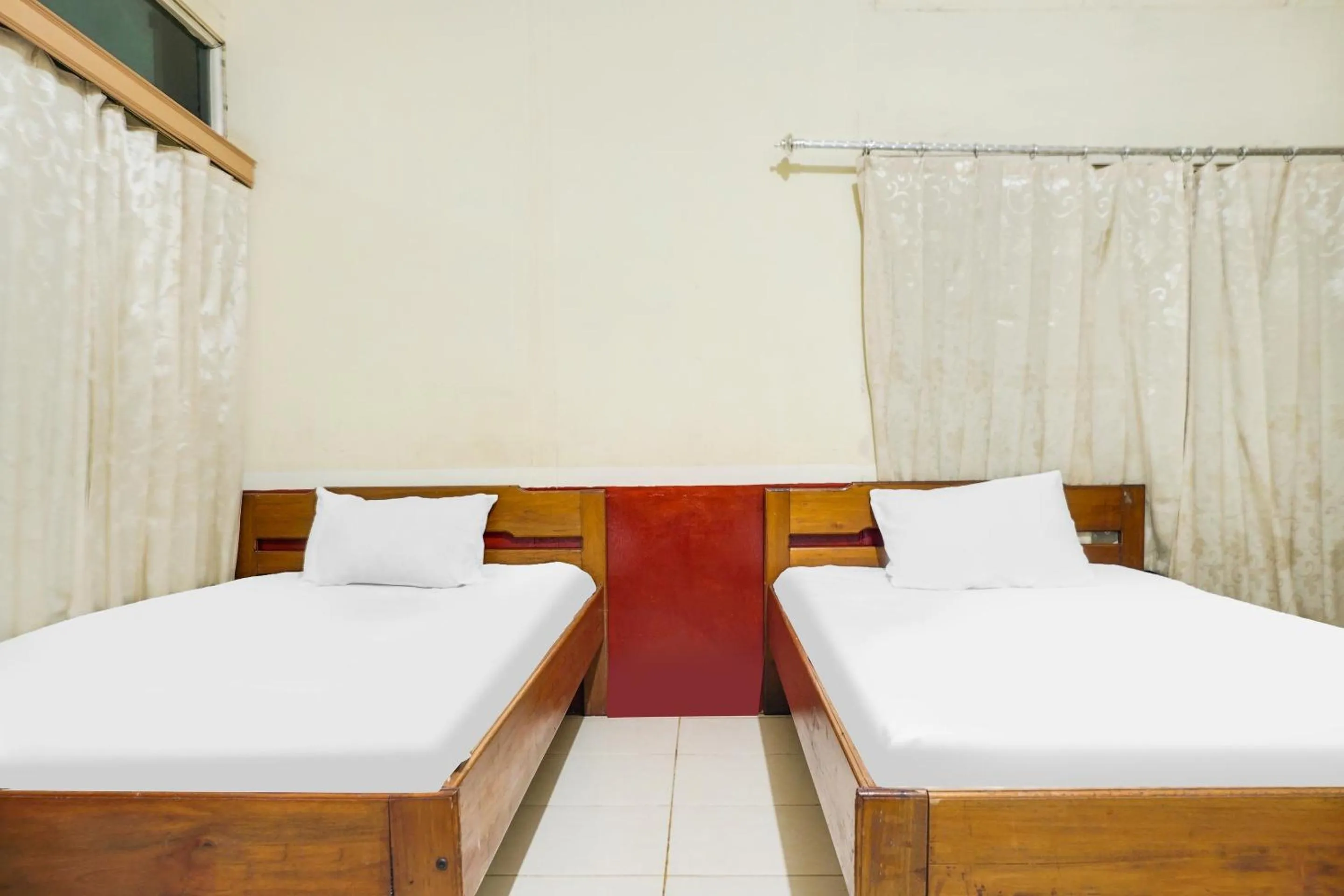 Bedroom in Hotel O Anggrek Daqu Syariah Kapuas