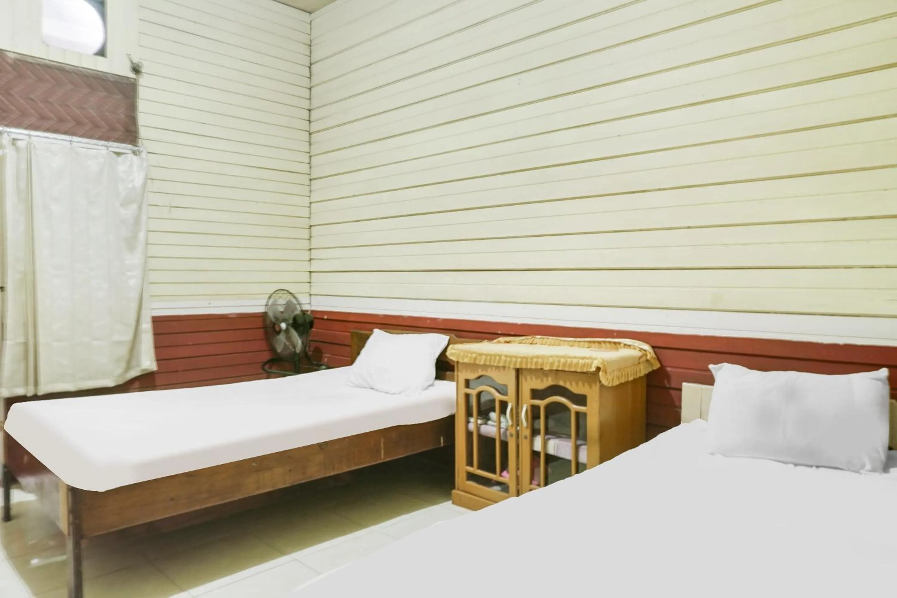 Bedroom in Hotel O Anggrek Daqu Syariah Kapuas