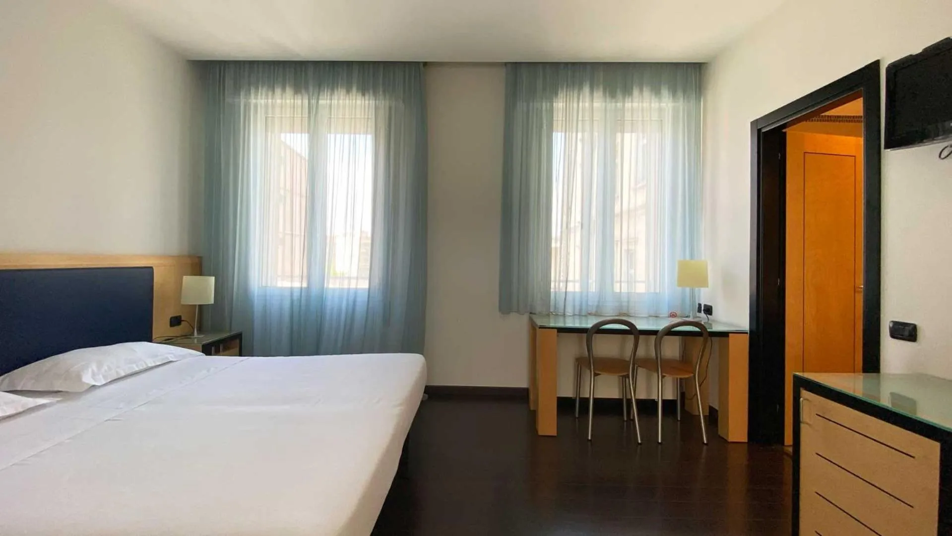 Bed in Luxury Rooms Padova Station