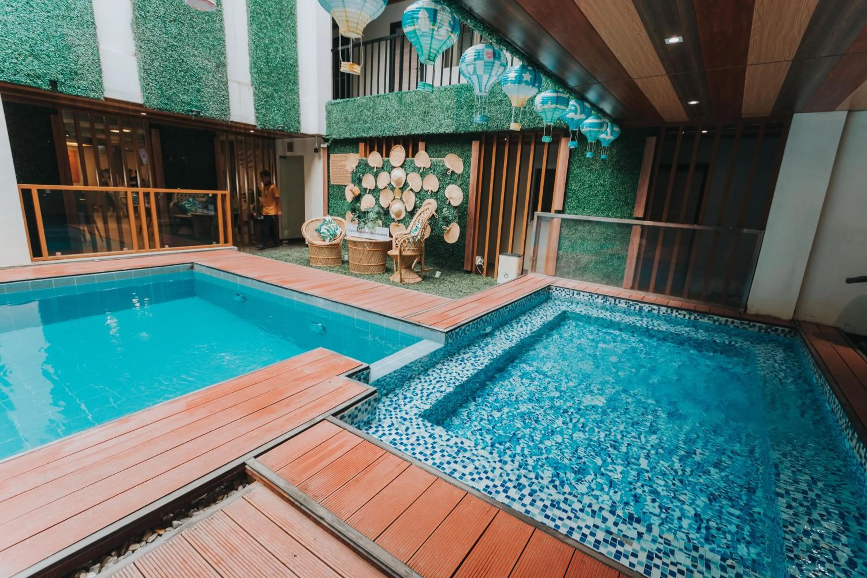 Swimming pool in SureStay Studio by Best Western Clarkview Angeles City