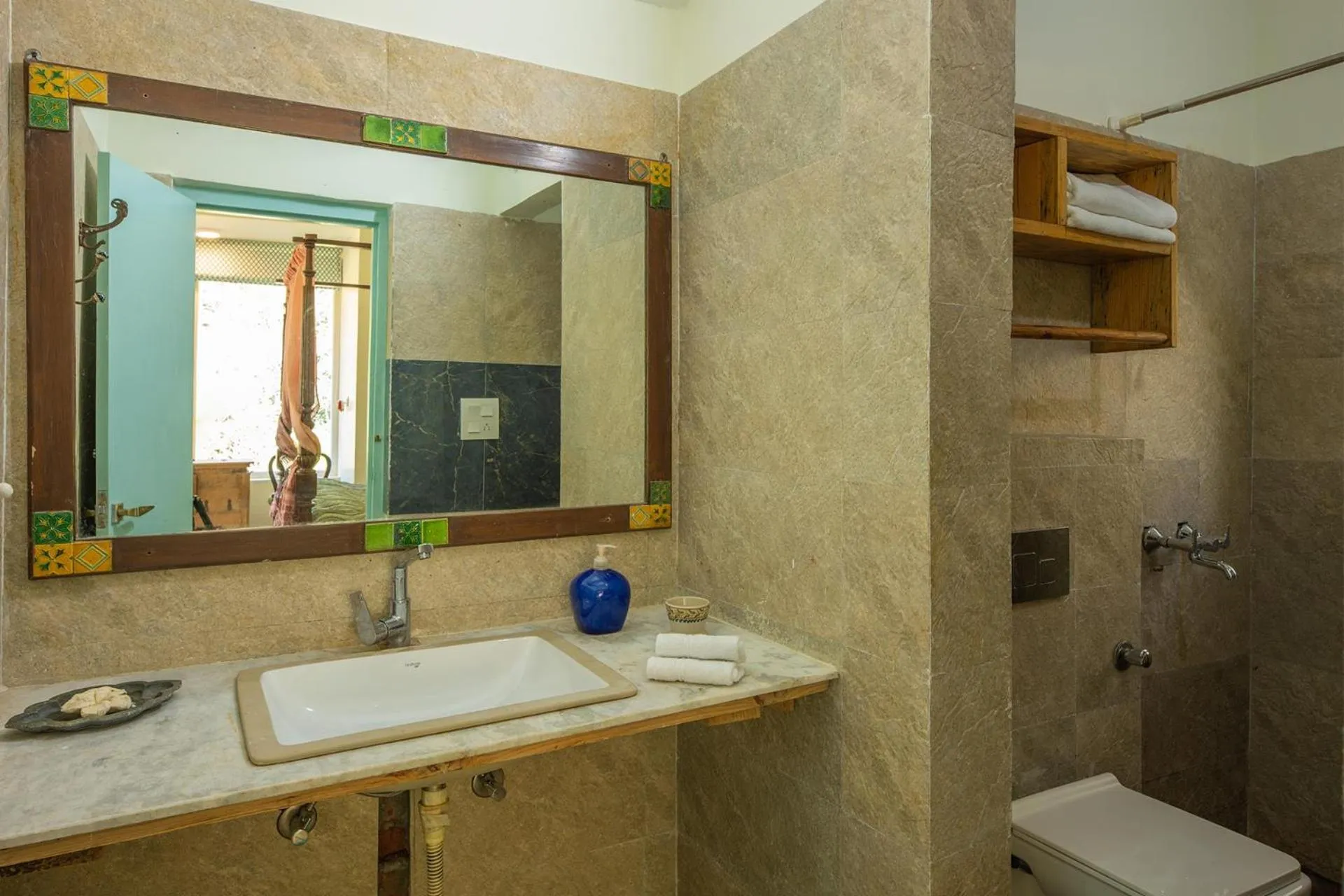 Bathroom in Hollyhock Cottage by VEO - Part of StayVista