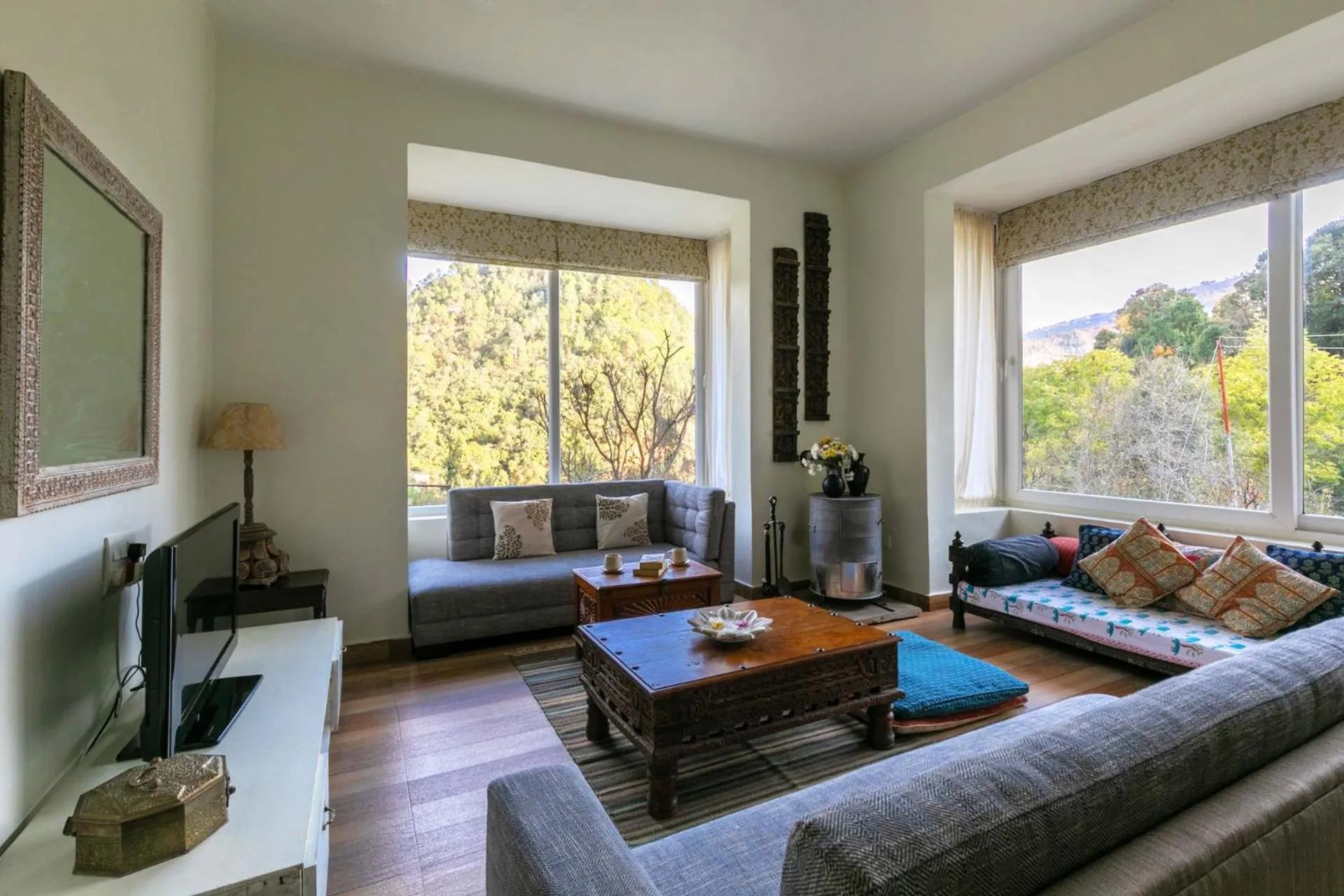 Living room in Hollyhock Cottage by VEO - Part of StayVista