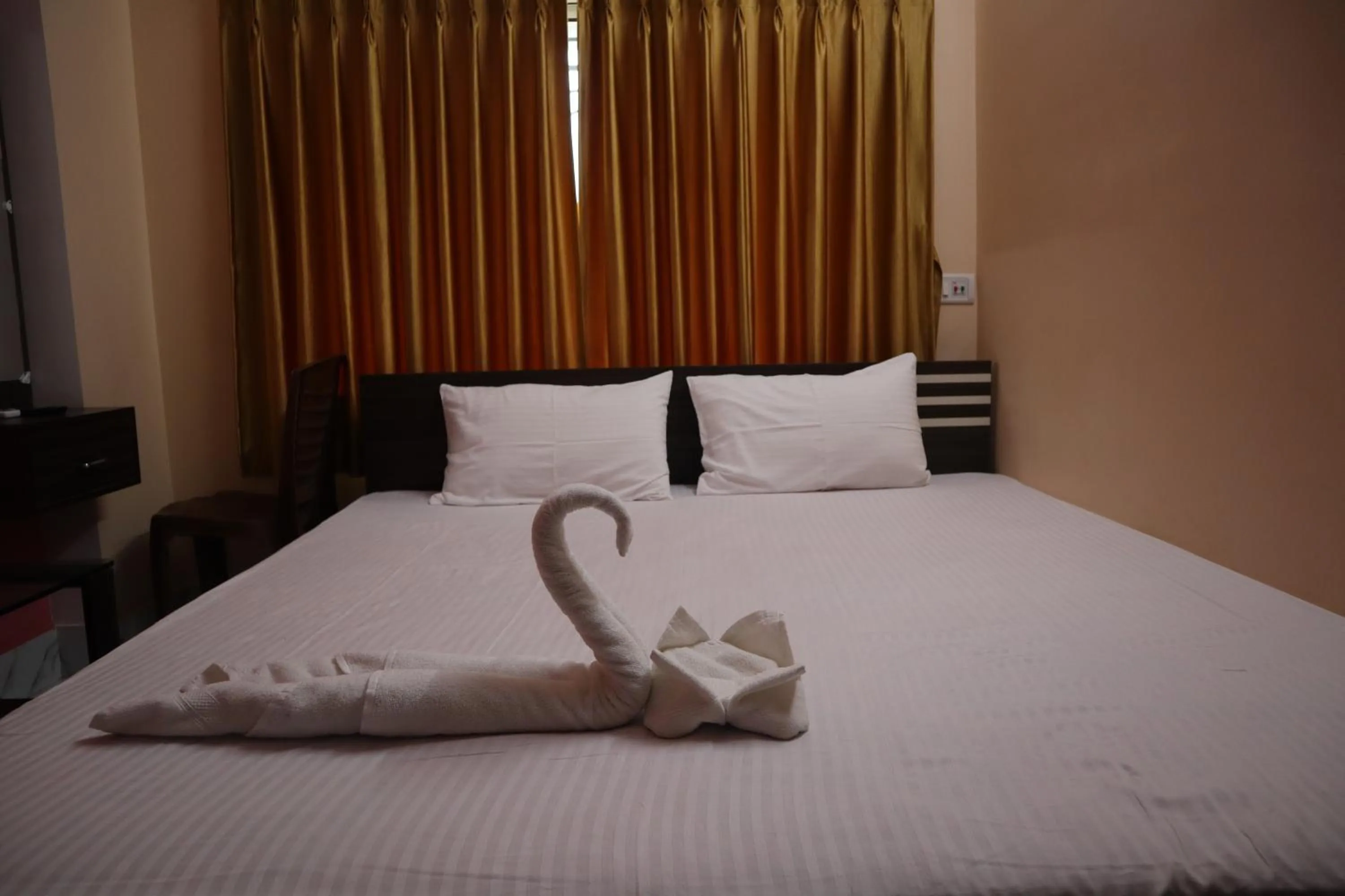 Bed in Hotel Saan Berhampore