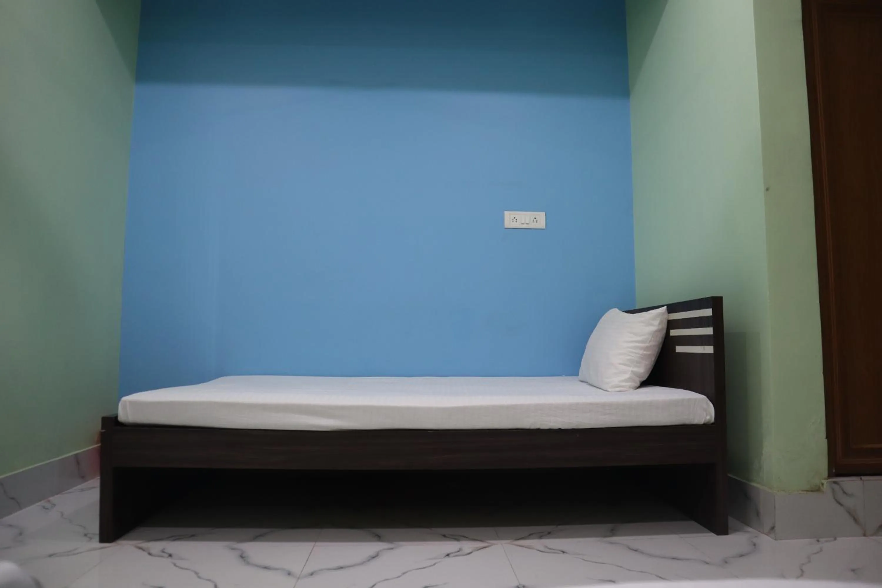 Bed in Hotel Saan Berhampore