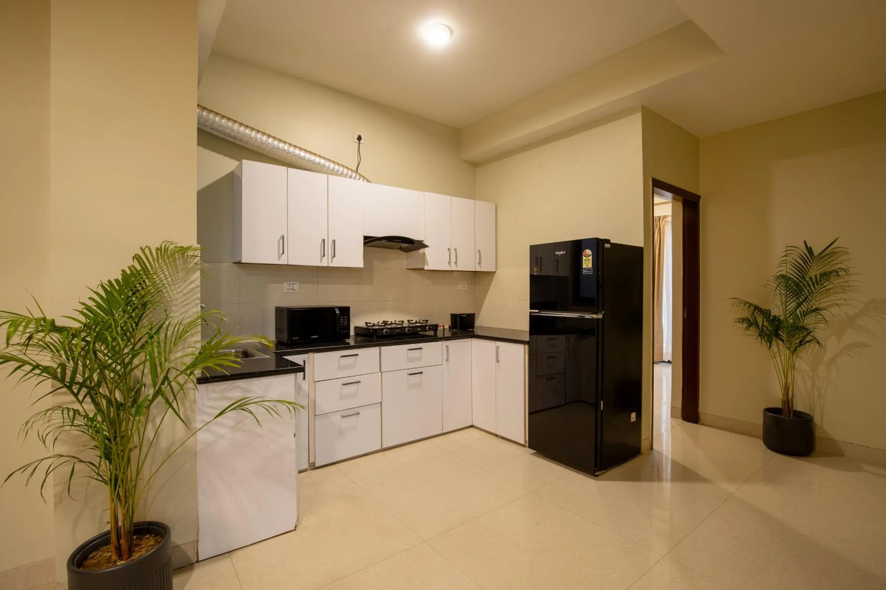 Kitchen or kitchenette in BedChambers Serviced Apartment, Medicity