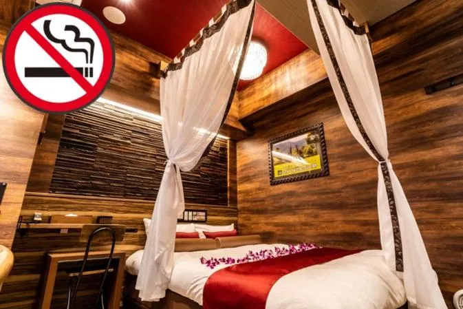 Bed in Petit Bali Forest Shinjuku Sanchōme