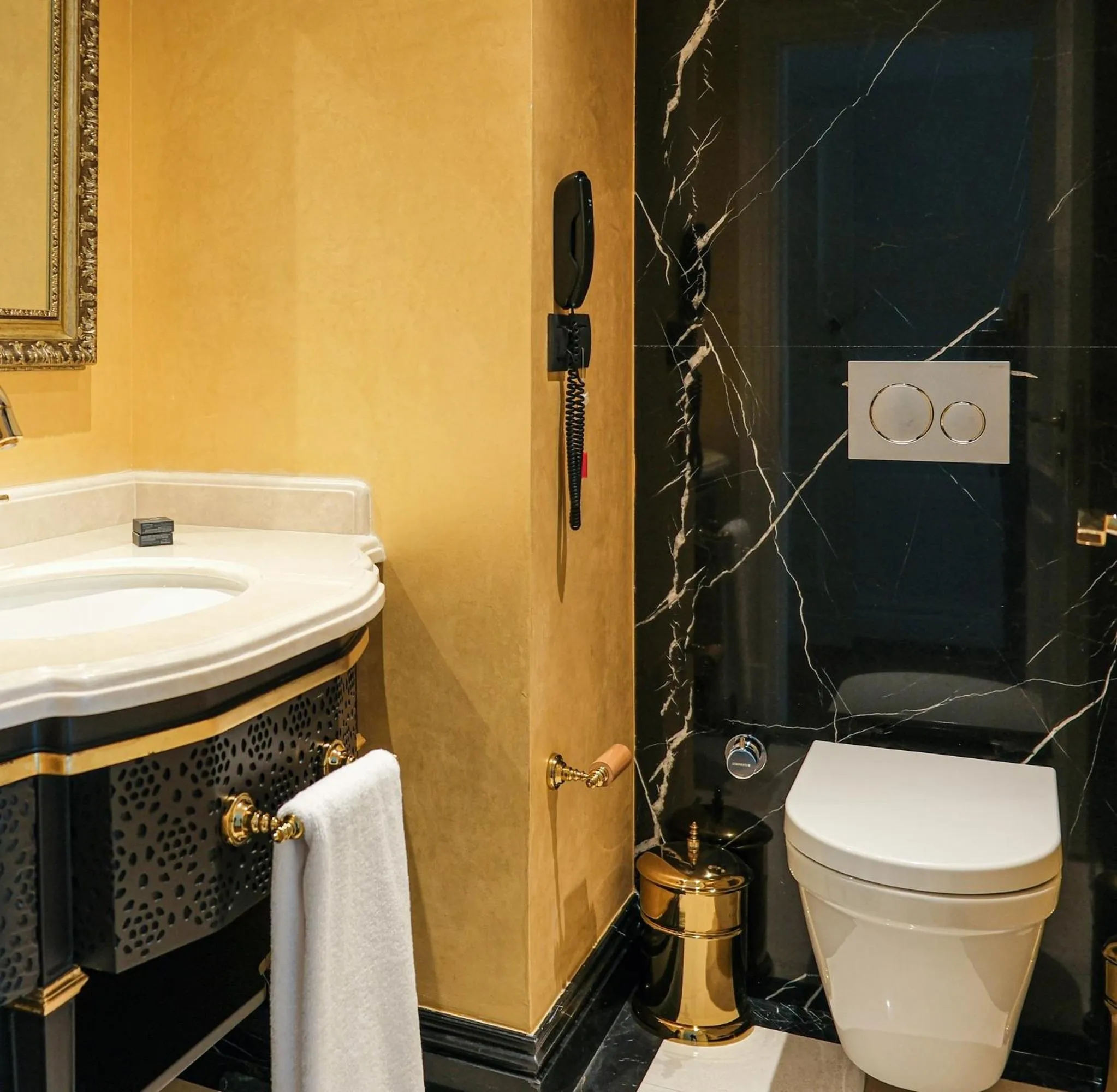 Toilet in Dekalb Hotel