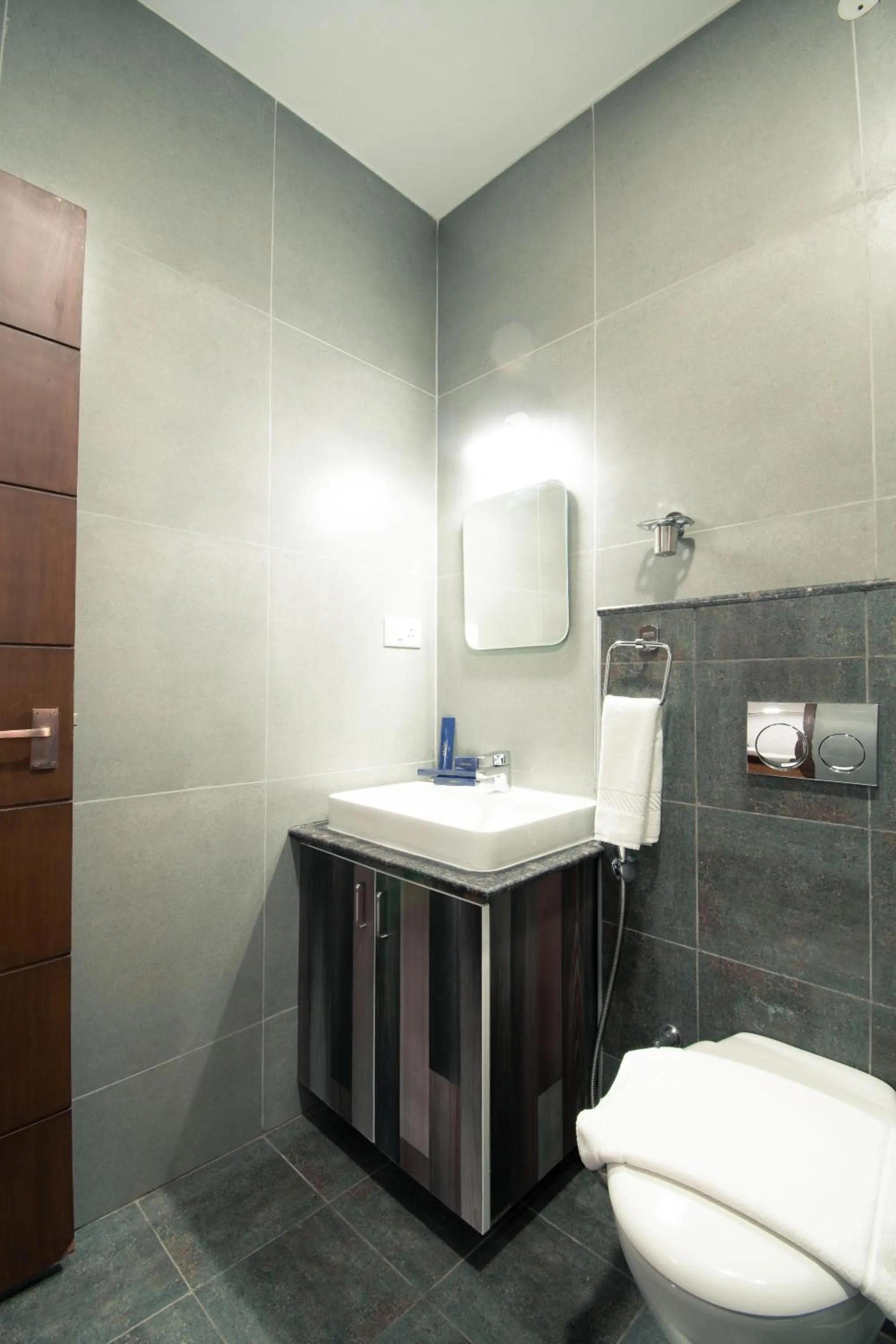 Toilet in Athulya Residence Suite Rooms