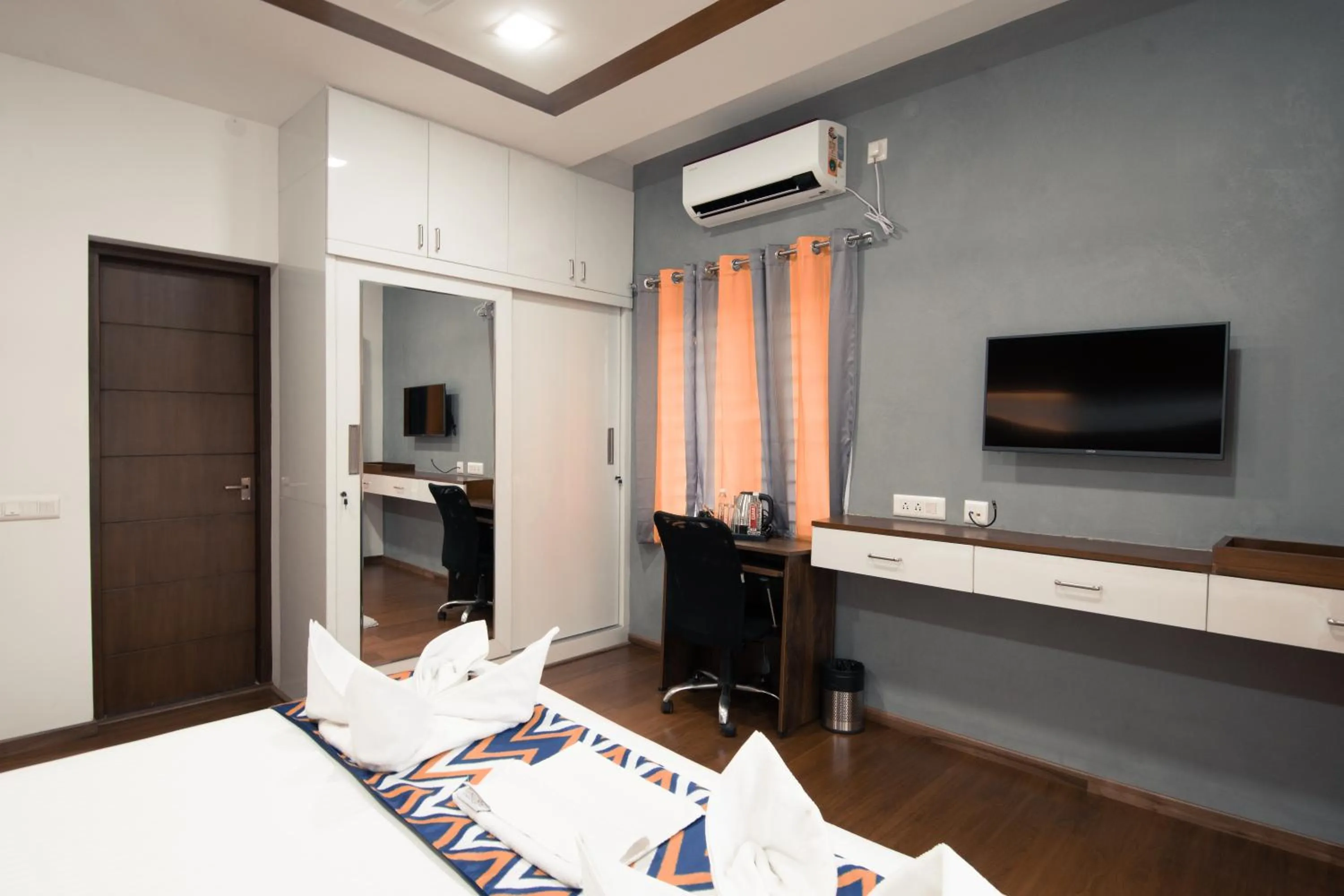 TV and multimedia, Bed in Athulya Residence Suite Rooms