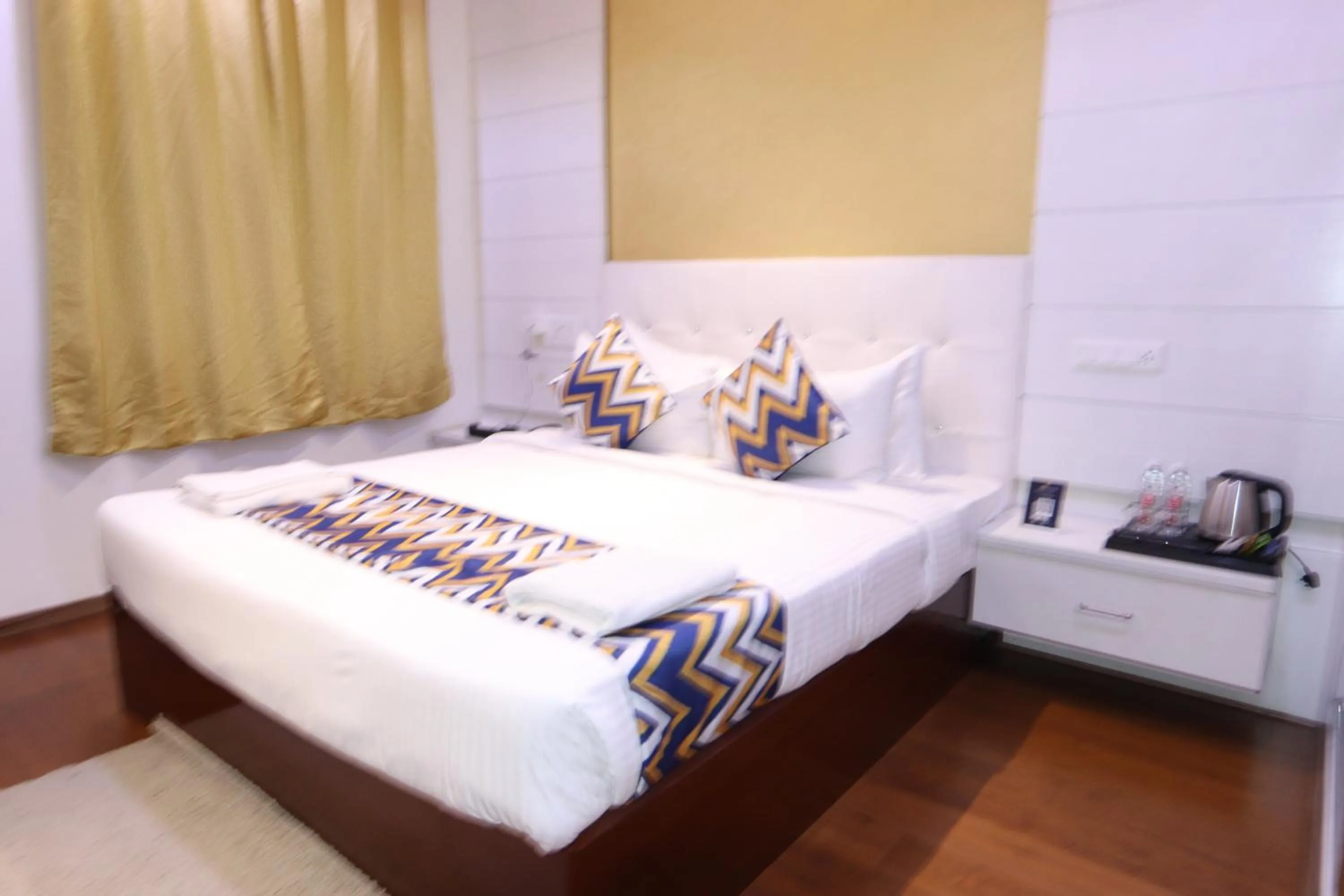 Bed in Athulya Residence Suite Rooms