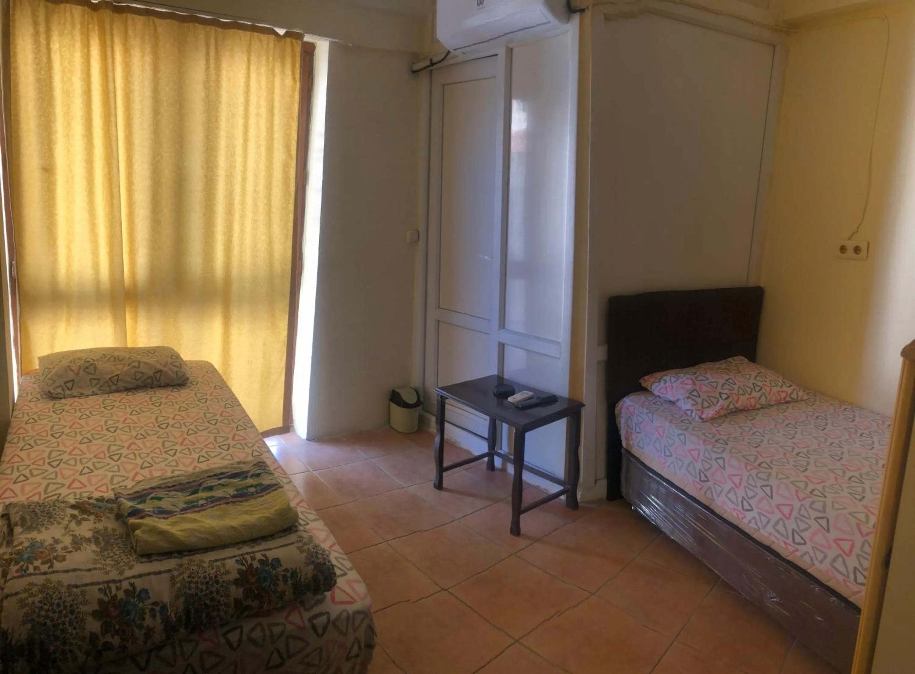 Photo of the whole room, Bed in DİZLEK PANSİYON