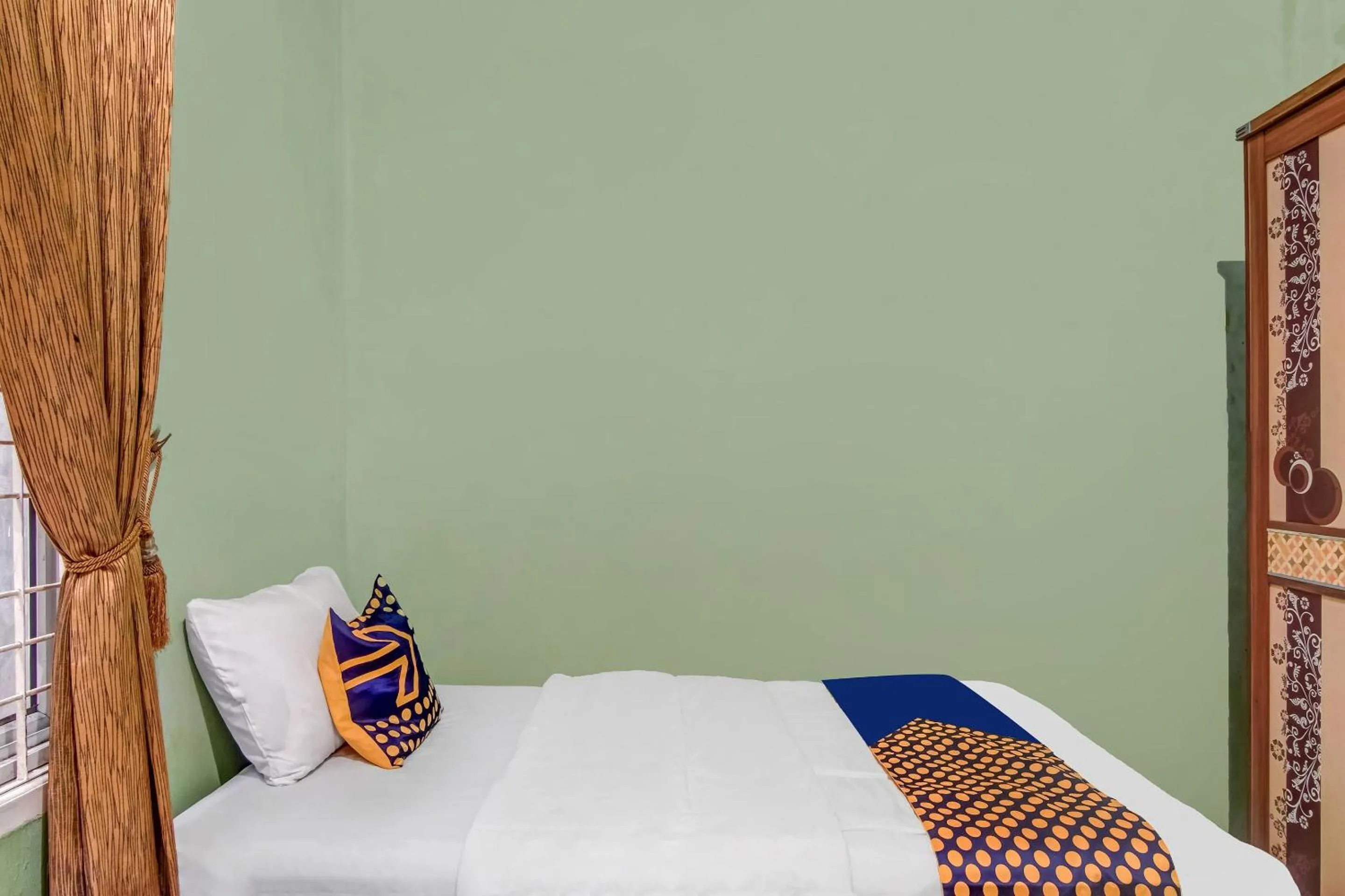 Bedroom, Bed in Hotel O Nayla Homestay Syariah Near Koro Koro Panam, Karaoke, Pool, & Cafe