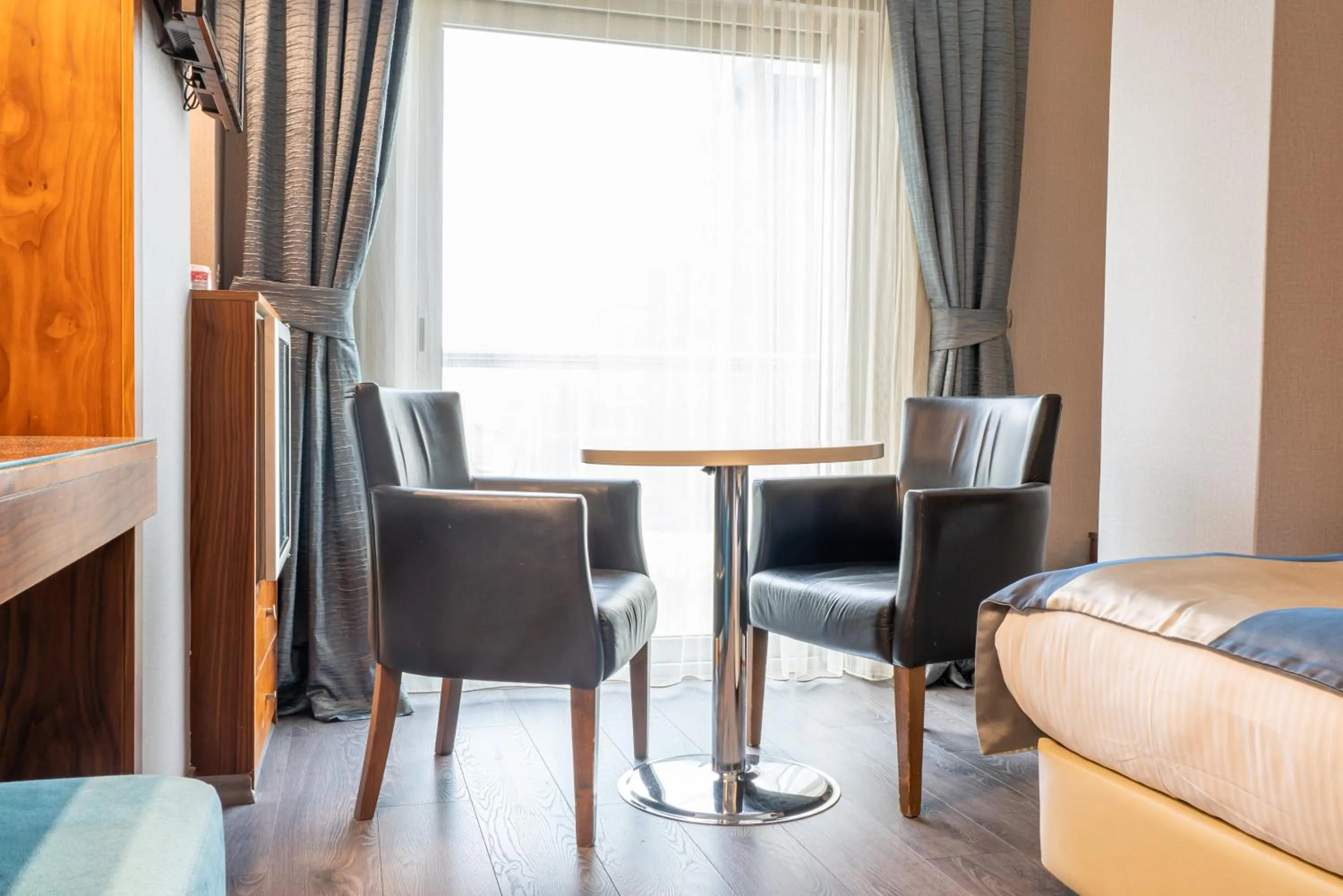 Seating area, Bed in Residence Hotel By Ketenci