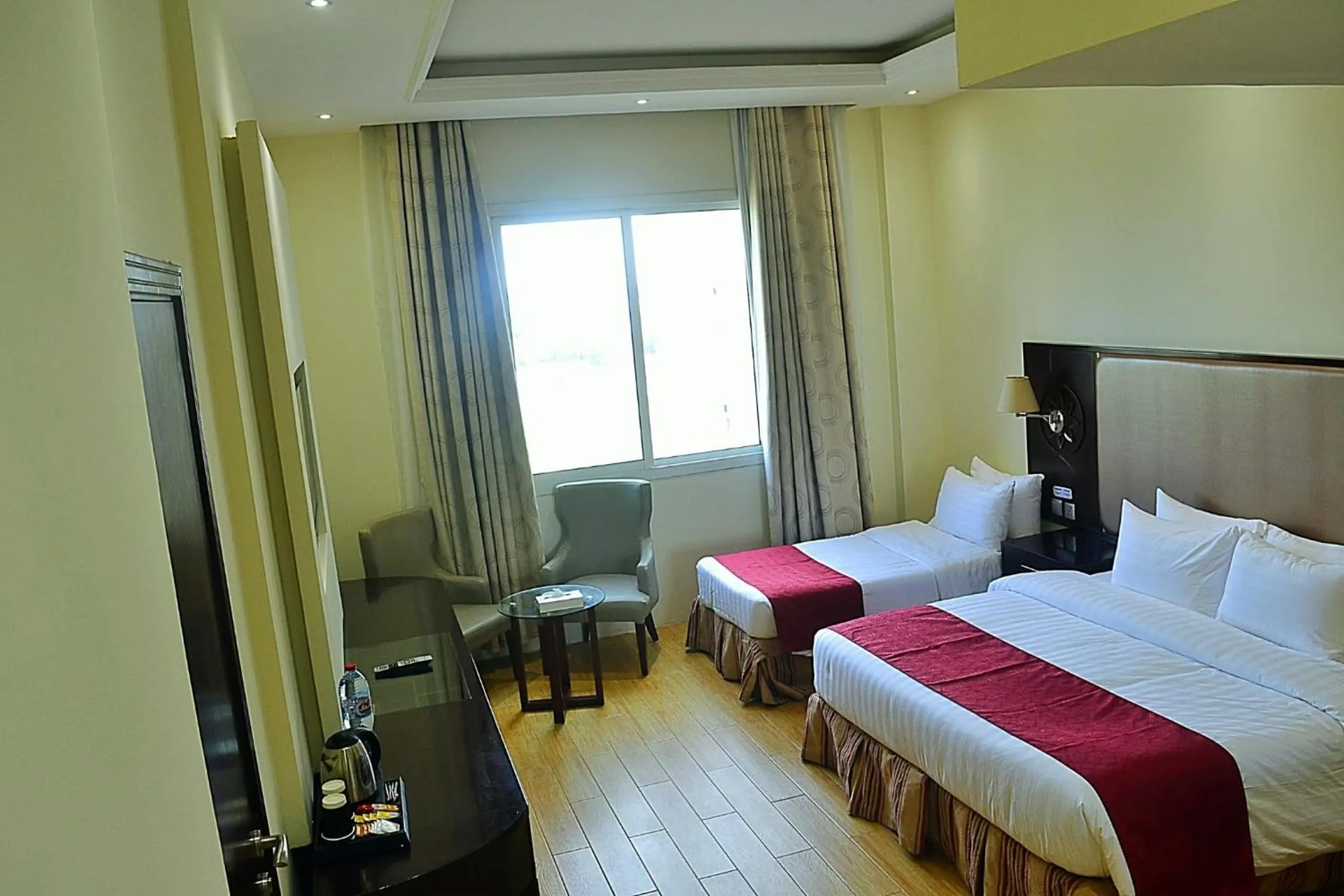 Bed in Palm Inn Hotel Doha