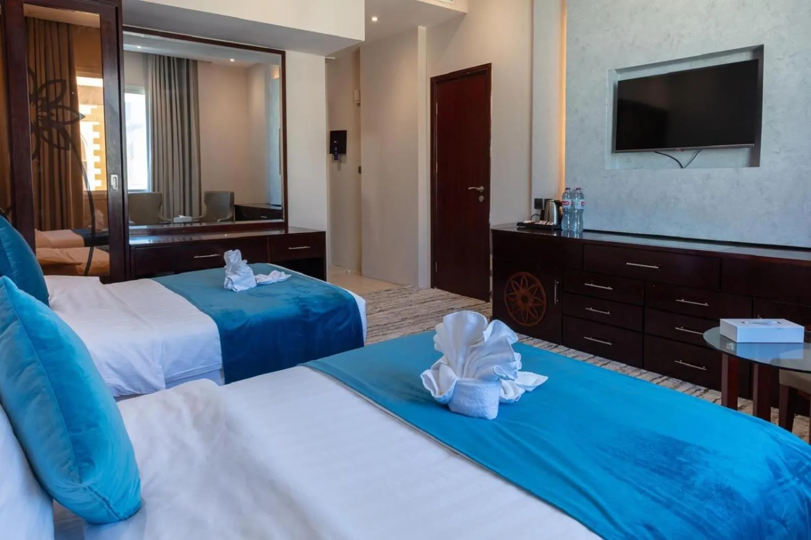 Bed in Palm Inn Hotel Doha